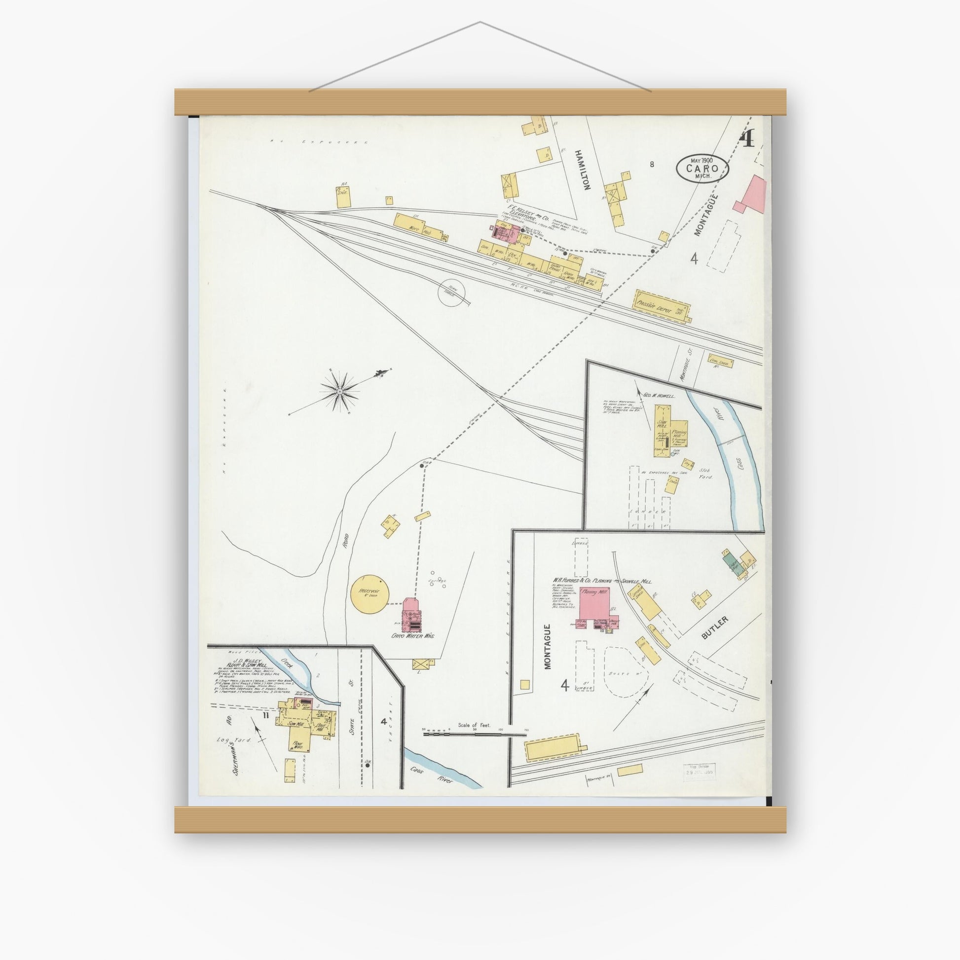 Old map wall art mockup — magnetic wood frame on white wall — Sanborn Fire Insurance Map from Caro, Tuscola County, Michigan (1900), Sheet #0004