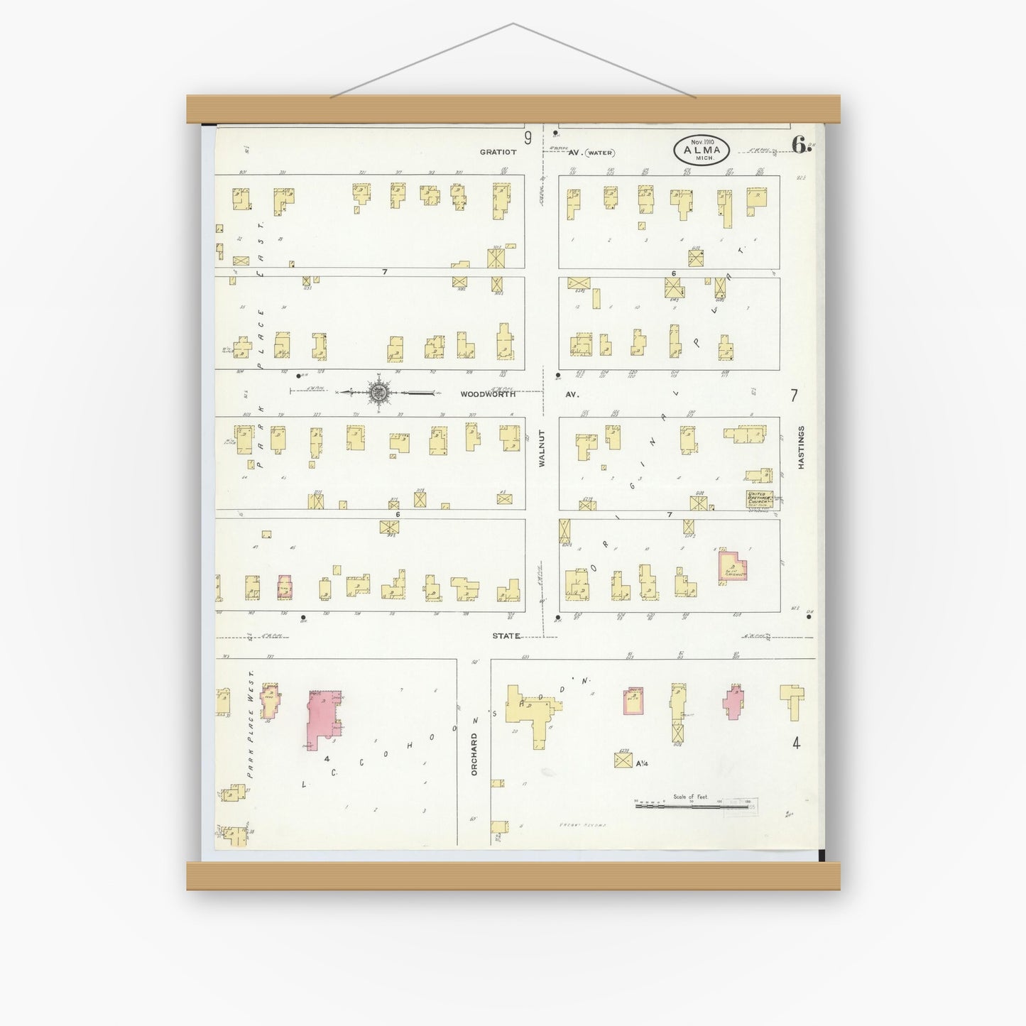 Old map wall art mockup — magnetic wood frame on white wall — Sanborn Fire Insurance Map from Alma, Gratiot County, Michigan (1910), Sheet #0006