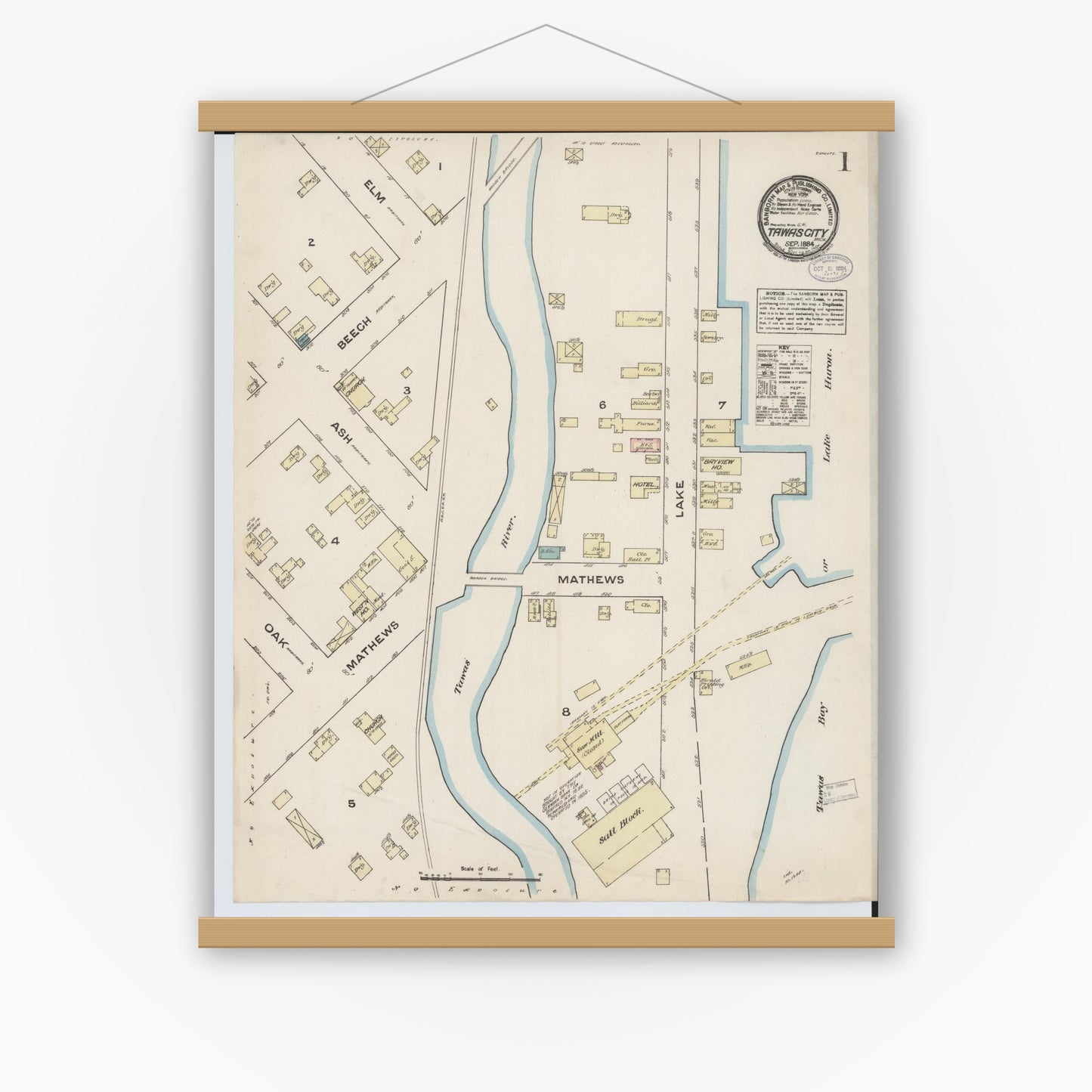 Old map wall art mockup — magnetic wood frame on white wall — Sanborn Fire Insurance Map from Tawas City, Iosco County, Michigan (1884) - Complete Map Set