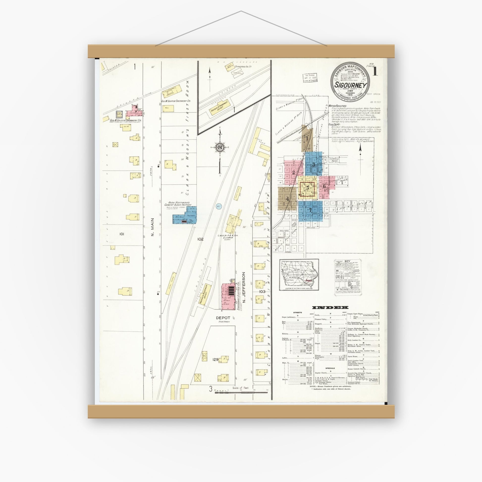 Old map wall art mockup — magnetic wood frame on white wall — Sanborn Fire Insurance Map from Sigourney, Kiokuk County, Iowa (1916) â€” Complete Set