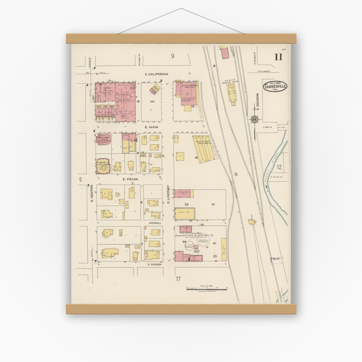 Old map wall art mockup — magnetic wood frame on white wall — Sanborn Fire Insurance Map from Gainesville, Cooke County, Texas (1922), Sheet #0011