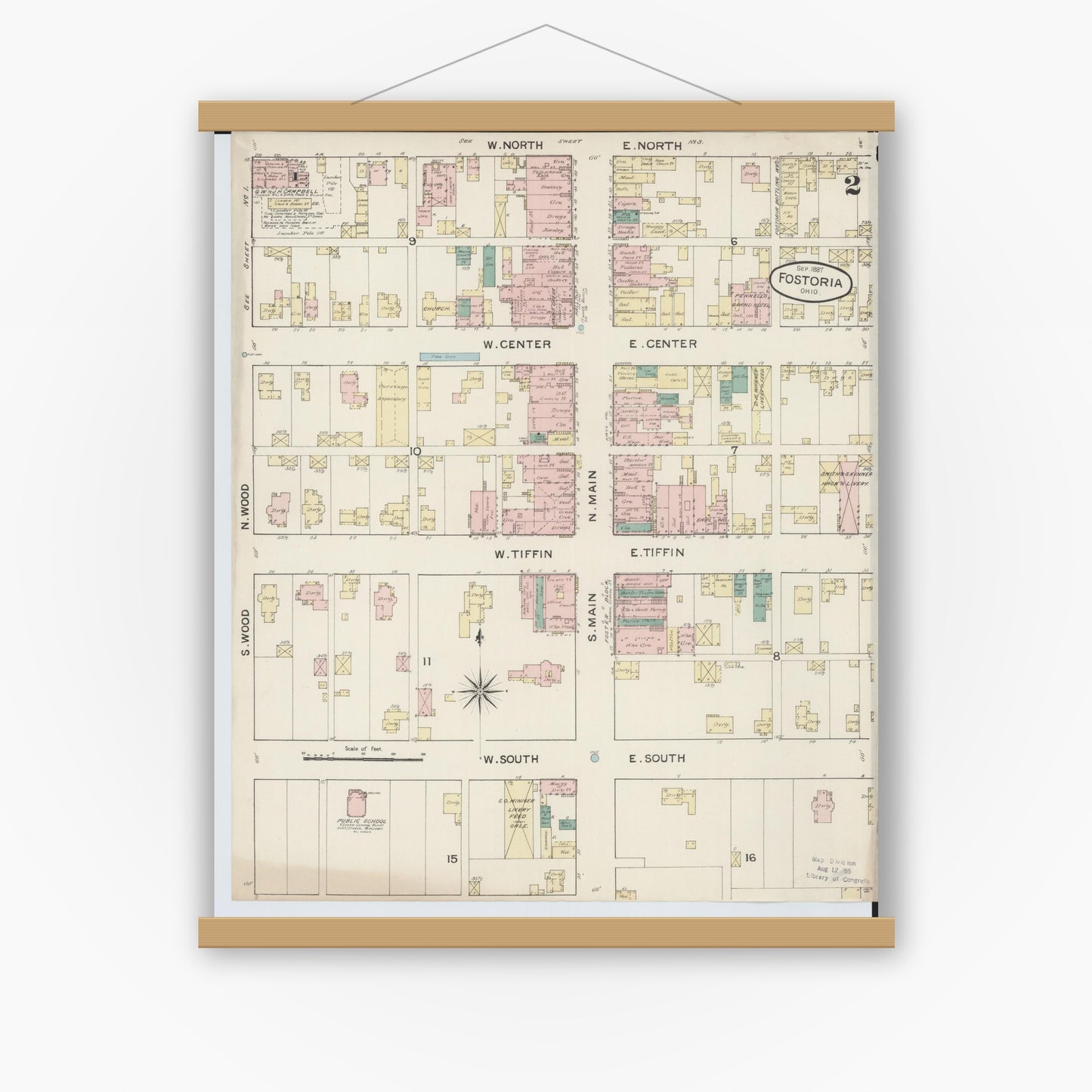 Old map wall art mockup — magnetic wood frame on white wall — Sanborn Fire Insurance Map from Fostoria, Seneca, Hancock, And Wood Counties, Ohio (1887), Sheet #0002
