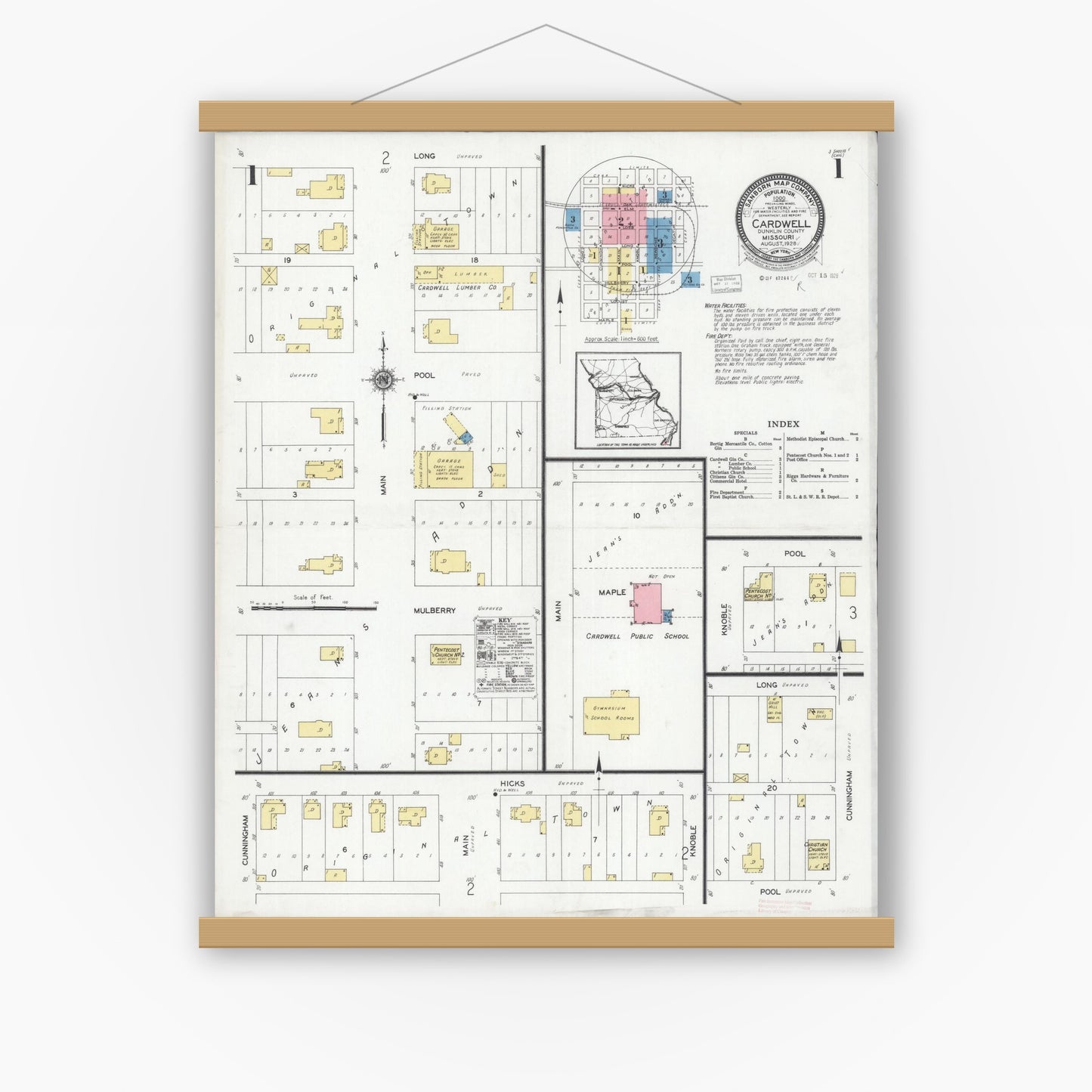 Old map wall art mockup — magnetic wood frame on white wall — Sanborn Fire Insurance Map from Cardwell, Dunklin County, Missouri (1928) - Complete Map Set