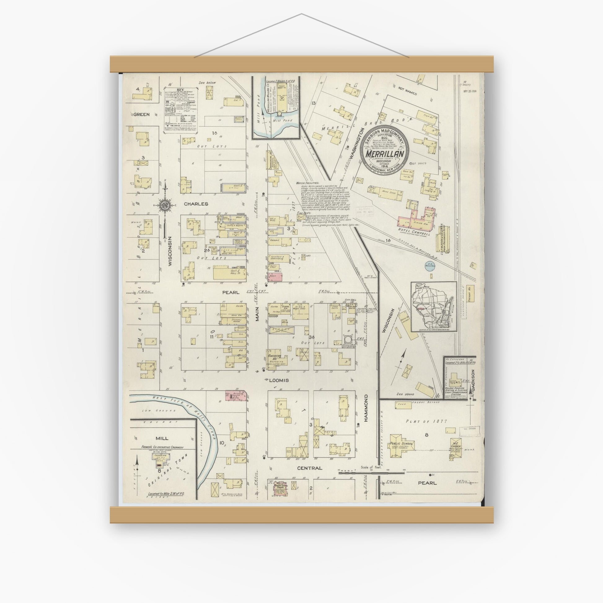 Old map wall art mockup — magnetic wood frame on white wall — Sanborn Fire Insurance Map from Merrillan, Jackson County, Wisconsin (1914), Sheet #0001