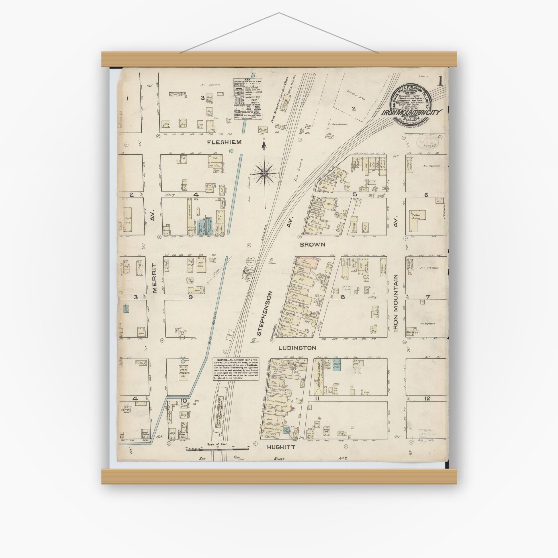 Old map wall art mockup — magnetic wood frame on white wall — Sanborn Fire Insurance Map from Iron Mountain, Dickinson County, Michigan (1884) - Complete Map Set