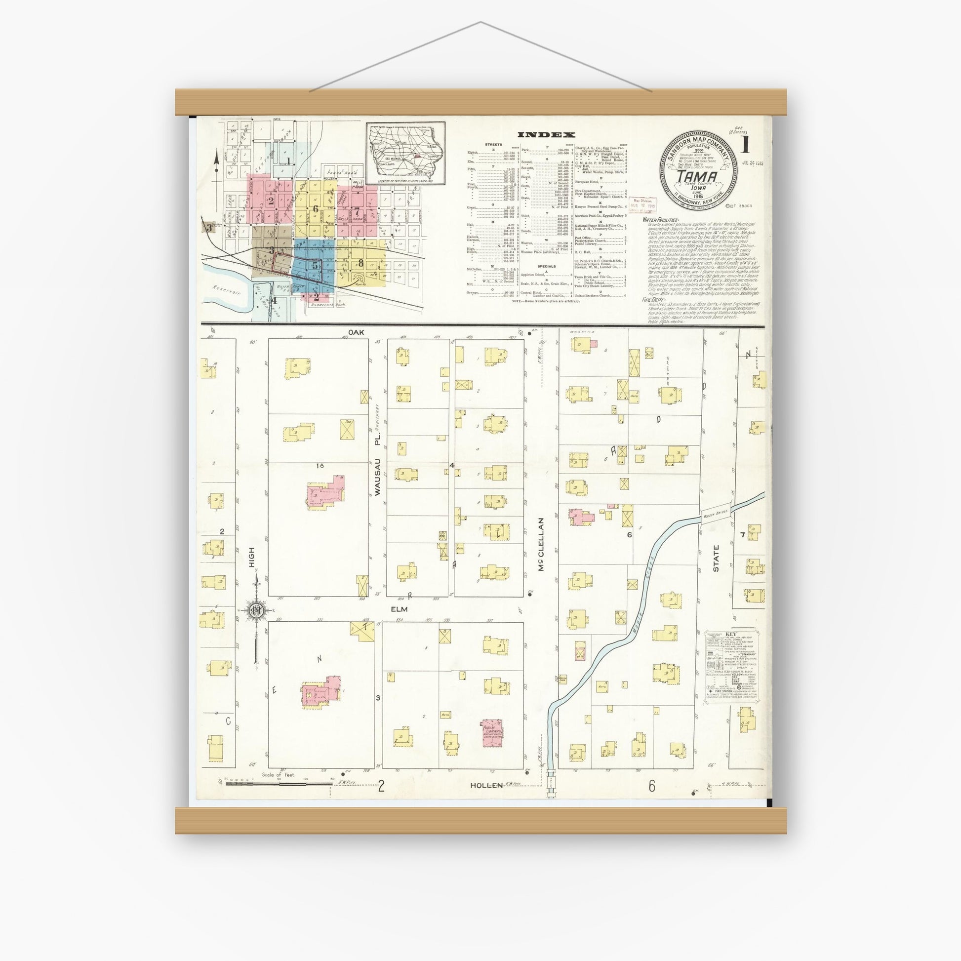 Old map wall art mockup — magnetic wood frame on white wall — Sanborn Fire Insurance Map from Tama, Tama County, Iowa (1915), Sheet #0001