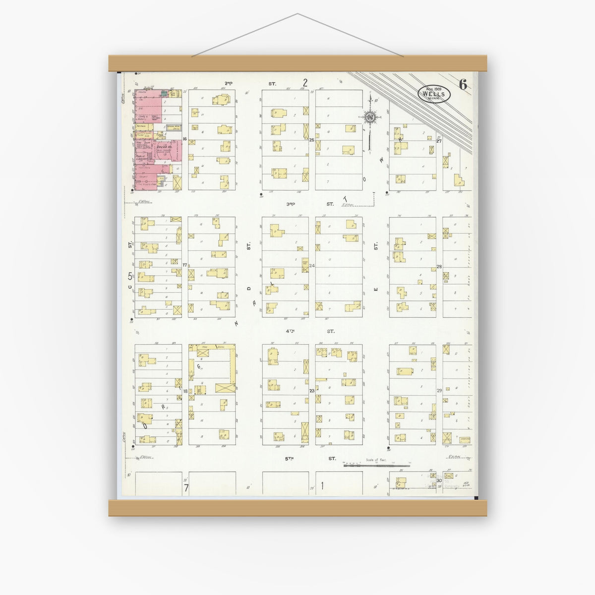 Old map wall art mockup — magnetic wood frame on white wall — Sanborn Fire Insurance Map from Wells, Faribault County, Minnesota (1909), Sheet #0006