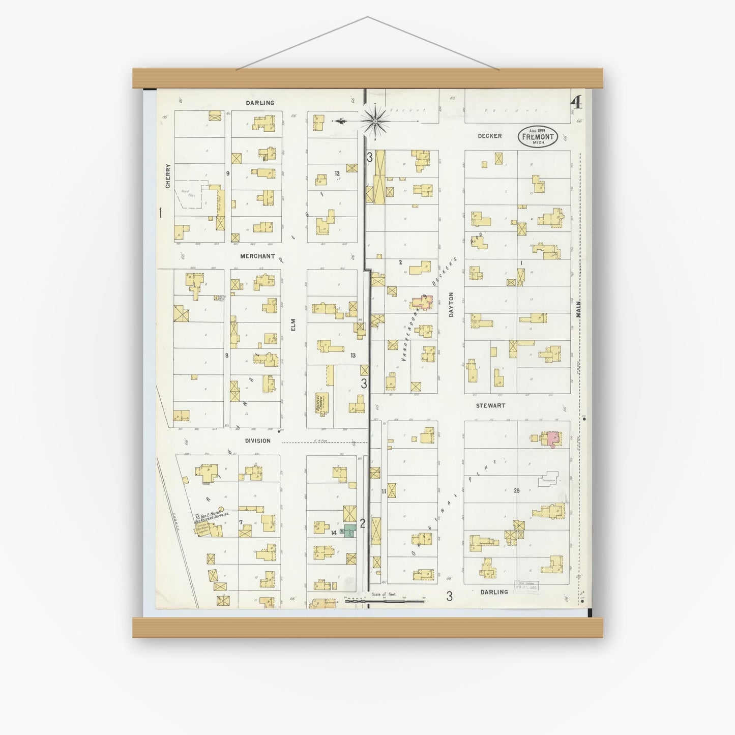 Old map wall art mockup — magnetic wood frame on white wall — Sanborn Fire Insurance Map from Fremont, Newaygo County, Michigan (1899), Sheet #0004