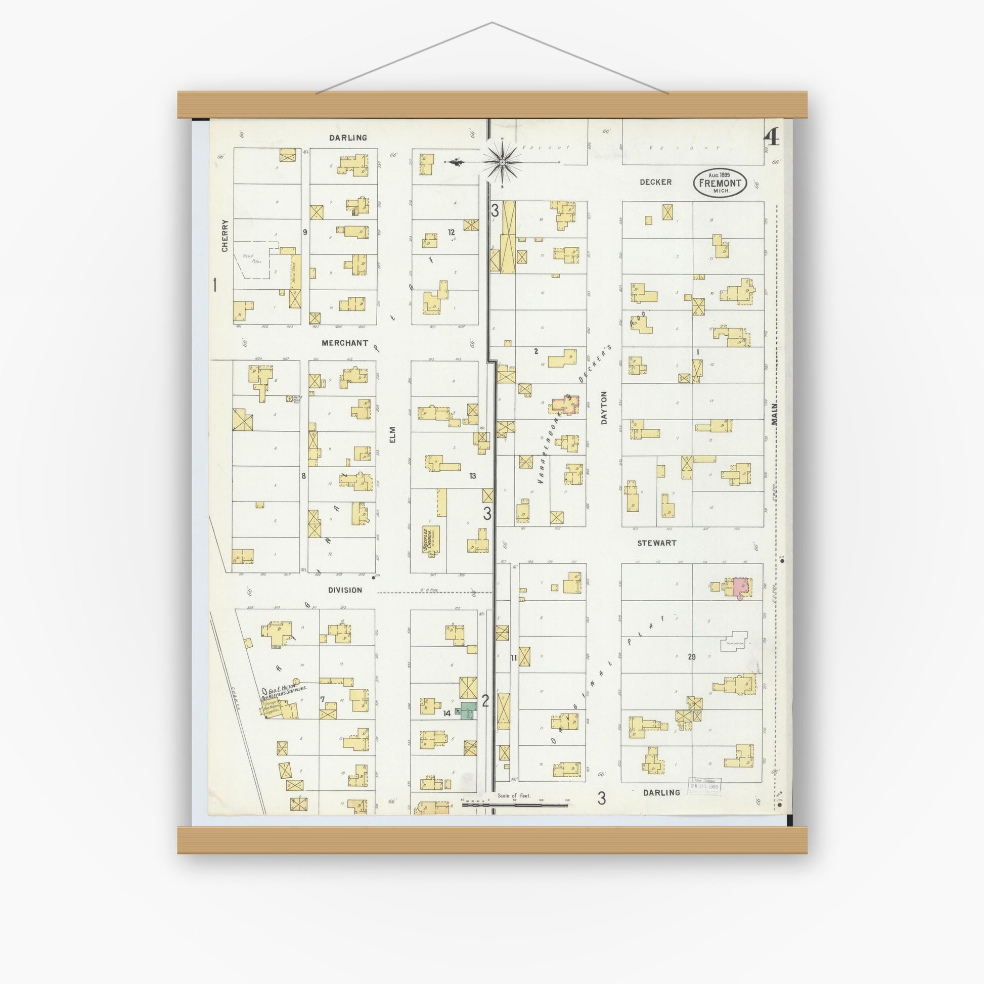 Old map wall art mockup — magnetic wood frame on white wall — Sanborn Fire Insurance Map from Fremont, Newaygo County, Michigan (1899), Sheet #0004