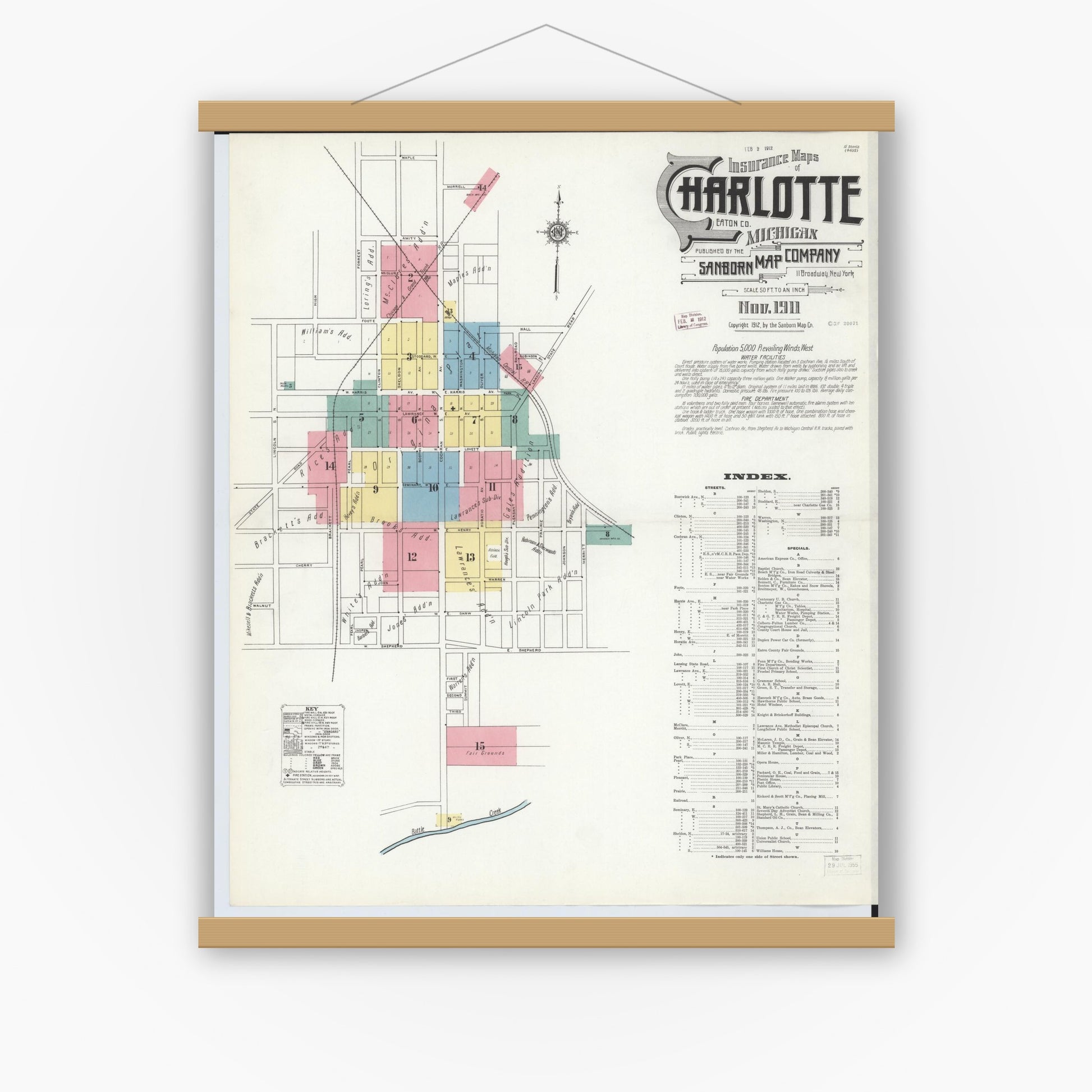 Old map wall art mockup — magnetic wood frame on white wall — Sanborn Fire Insurance Map from Charlotte, Eaton County, Michigan (1911) - Complete Map Set