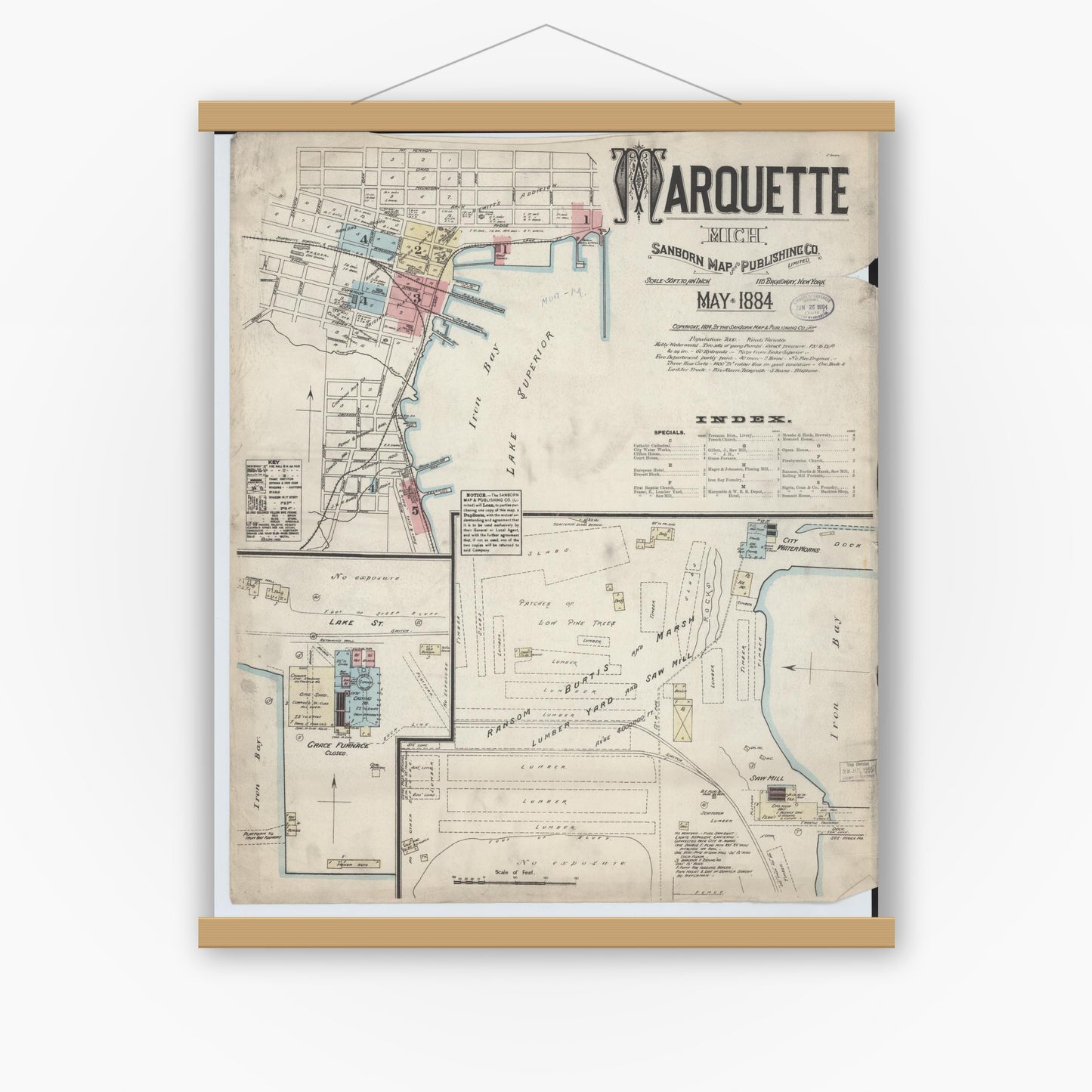 Old map wall art mockup — magnetic wood frame on white wall — Sanborn Fire Insurance Map from Marquette, Marquette County, Michigan (1884) - Complete Map Set