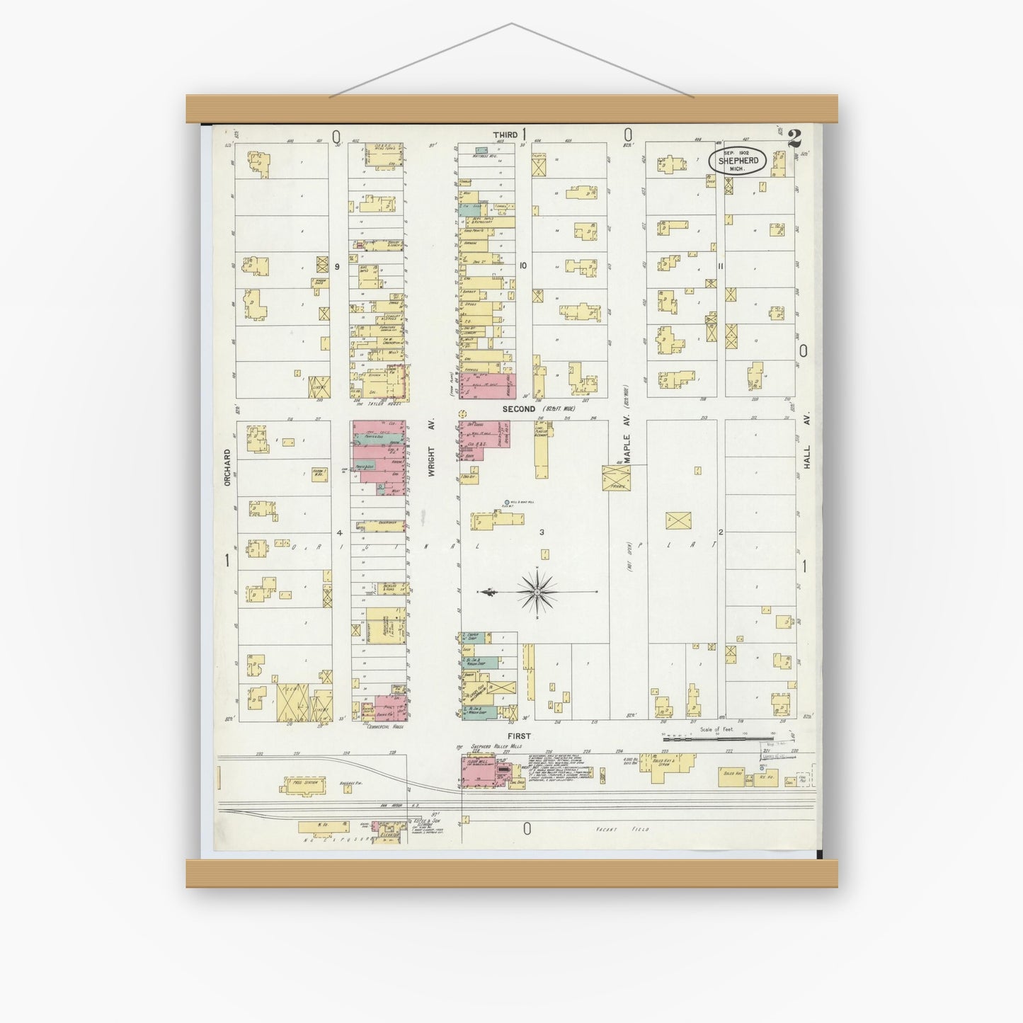 Old map wall art mockup — magnetic wood frame on white wall — Sanborn Fire Insurance Map from Shepherd, Isabella County, Michigan (1902), Sheet #0002