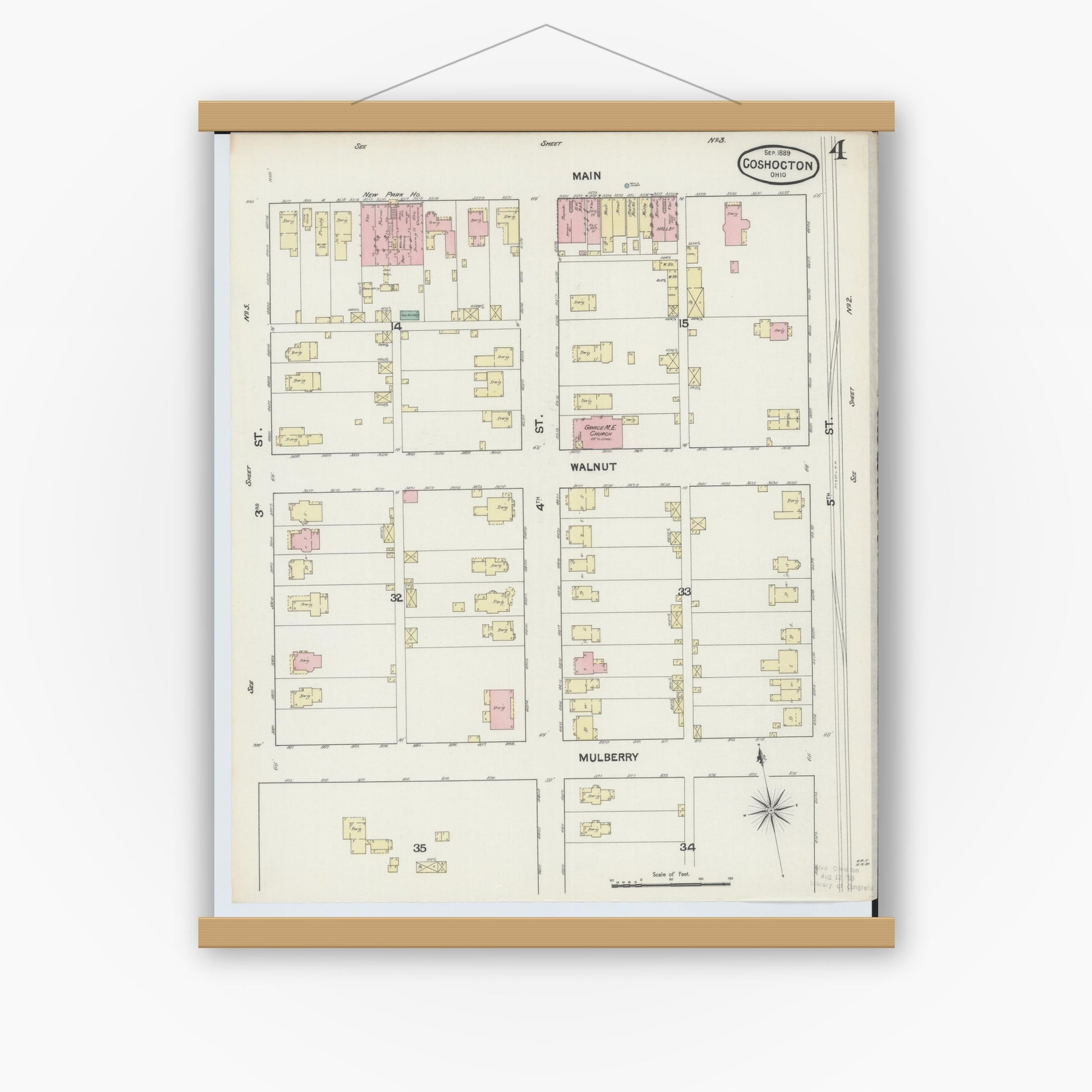 Old map wall art mockup — magnetic wood frame on white wall — Sanborn Fire Insurance Map from Coshocton, Coshocton County, Ohio (1889), Sheet #0004