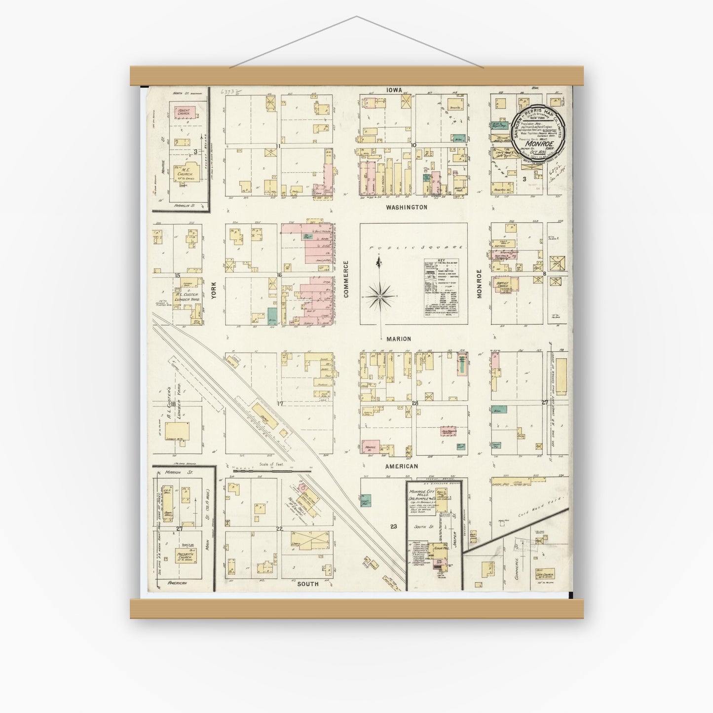 Old map wall art mockup — magnetic wood frame on white wall — Sanborn Fire Insurance Map from Monroe, Jasper County, Iowa (1895), Sheet #0001
