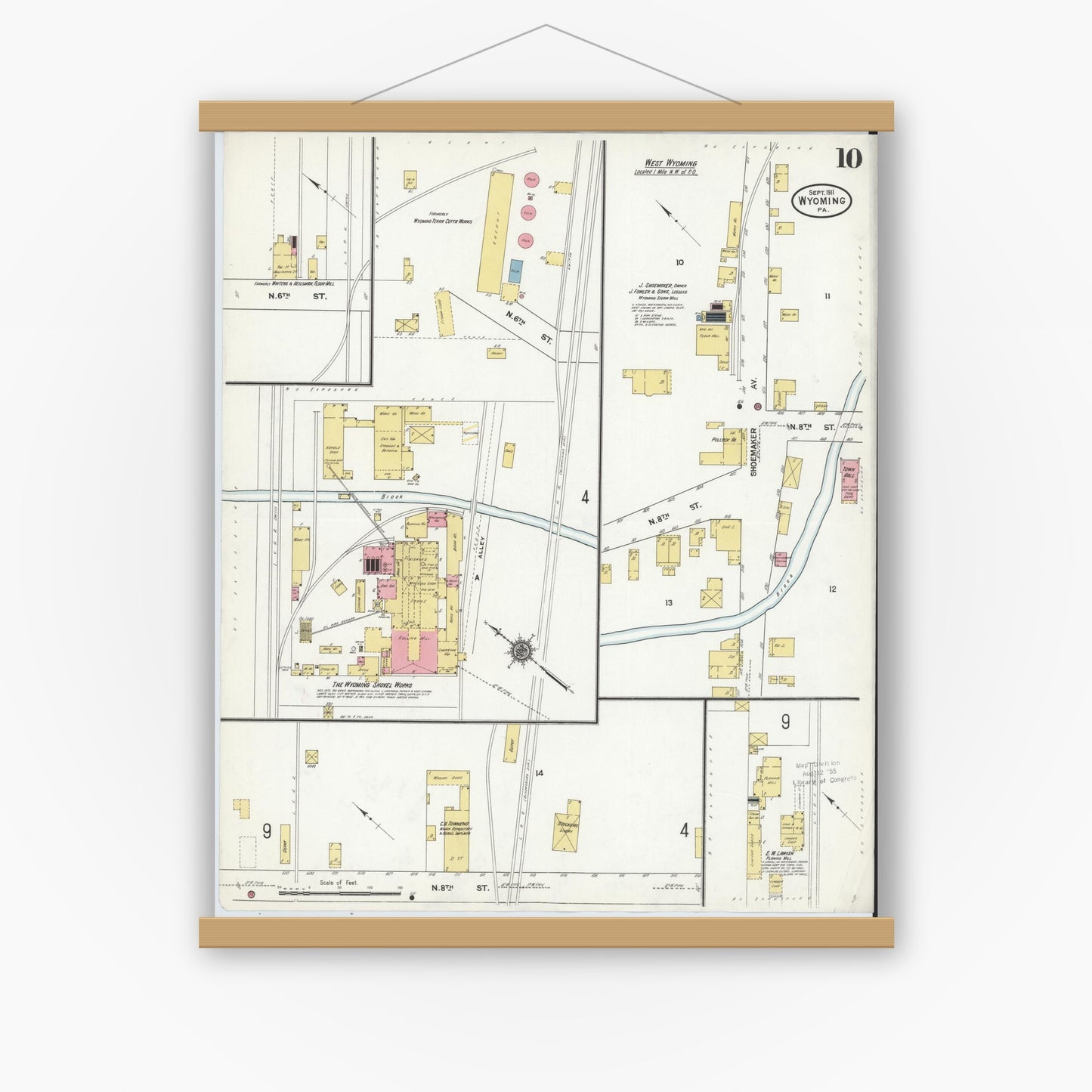 Old map wall art mockup — magnetic wood frame on white wall — Sanborn Fire Insurance Map from Wyoming, Luzerne County, Pennsylvania (1911), Sheet #0010