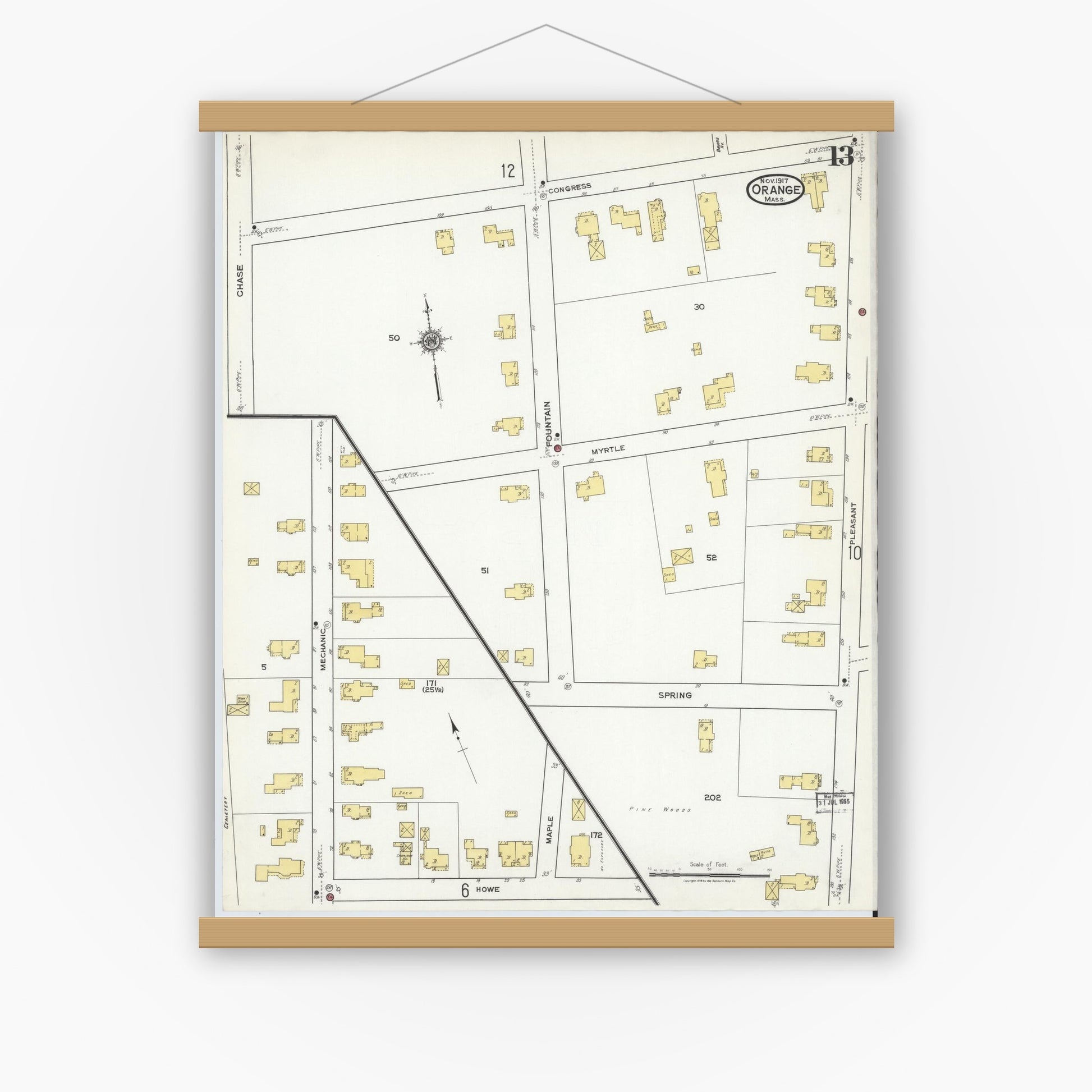 Old map wall art mockup — magnetic wood frame on white wall — Sanborn Fire Insurance Map from Orange, Franklin County, Massachusetts (1917), Sheet #0013