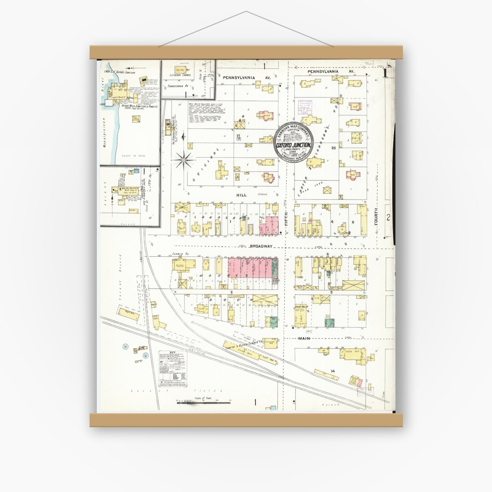 Old map wall art mockup — magnetic wood frame on white wall — Sanborn Fire Insurance Map from Oxford Junction, Jones County, Iowa (1905), Sheet #0001