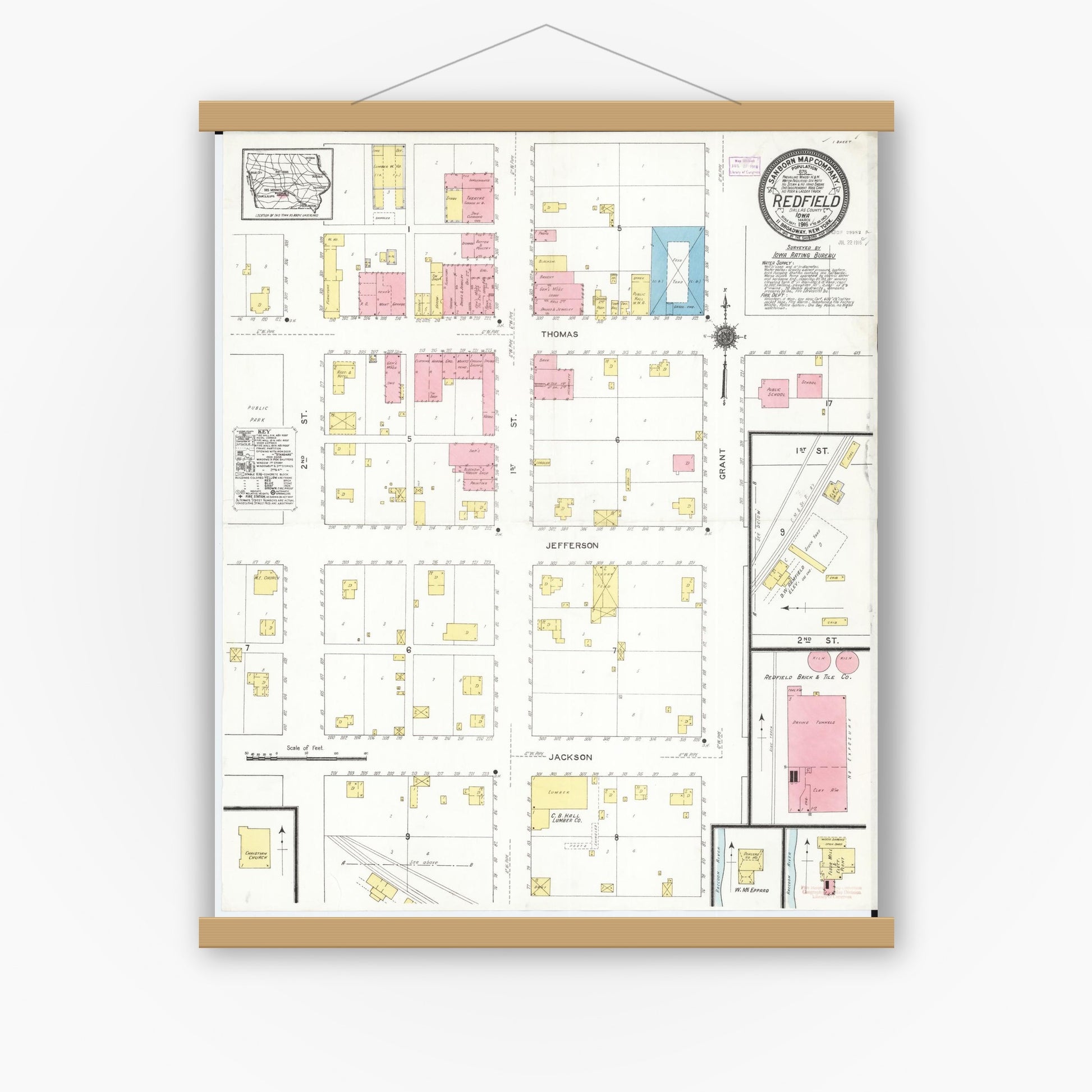 Old map wall art mockup — magnetic wood frame on white wall — Sanborn Fire Insurance Map from Redfield, Dallas County, Iowa (1916), Sheet #0001