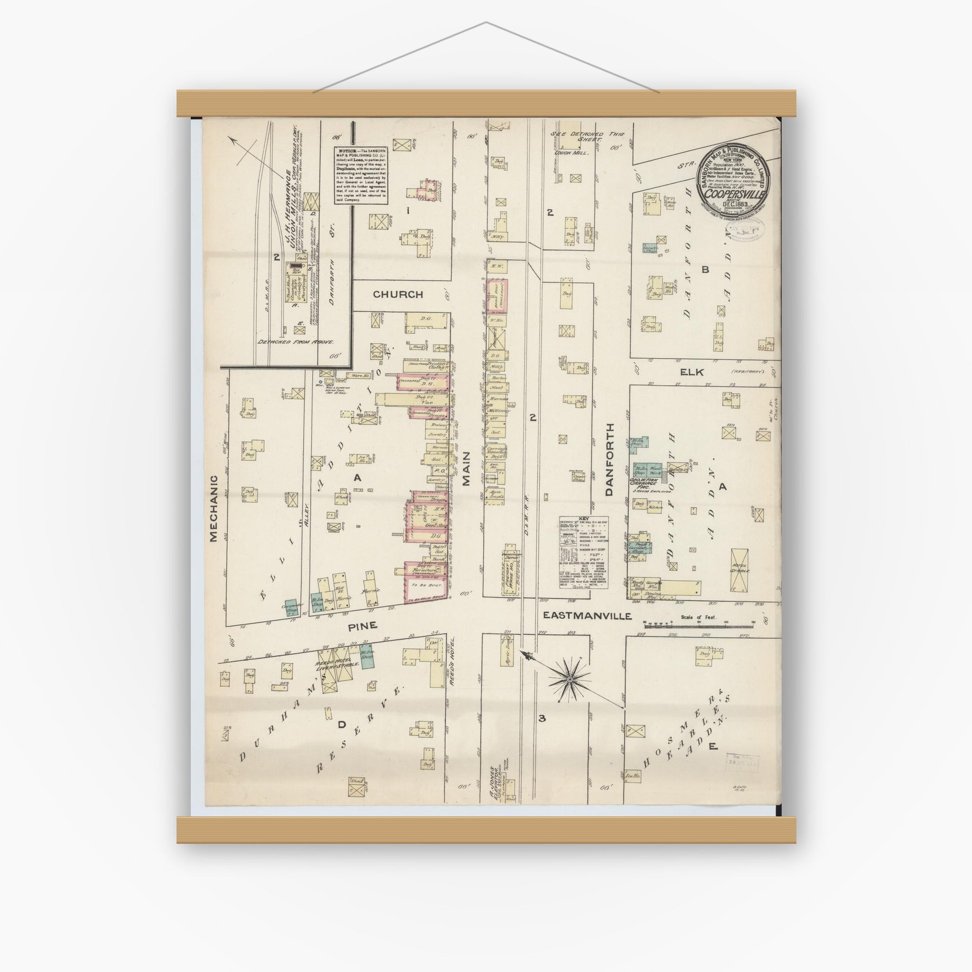 Old map wall art mockup — magnetic wood frame on white wall — Sanborn Fire Insurance Map from Coopersville, Ottawa County, Michigan (1883), Sheet #0001