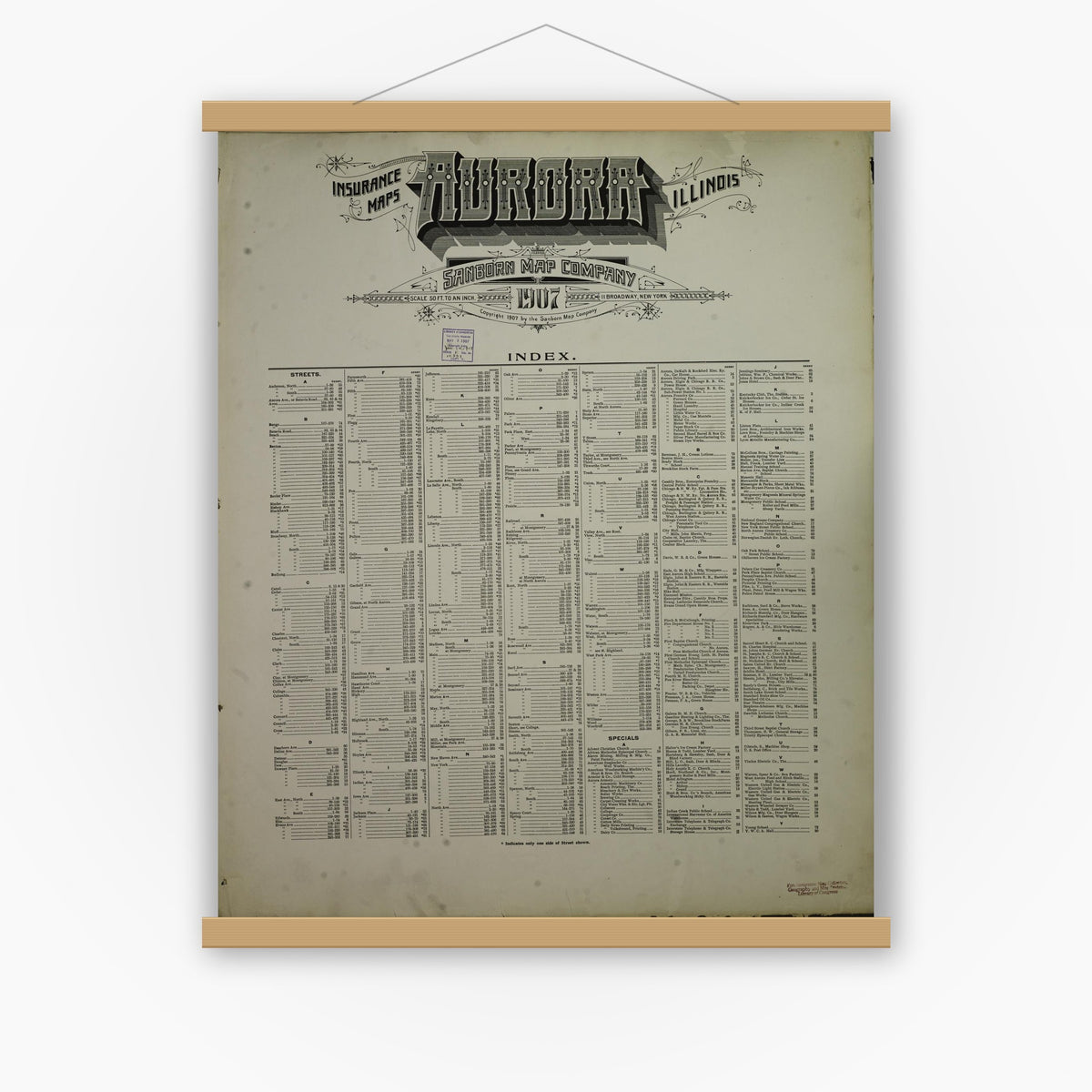 Old map wall art mockup — magnetic wood frame on white wall — Sanborn Fire Insurance Map from Aurora, Kane County, Illinois (1907), Sheet #0001