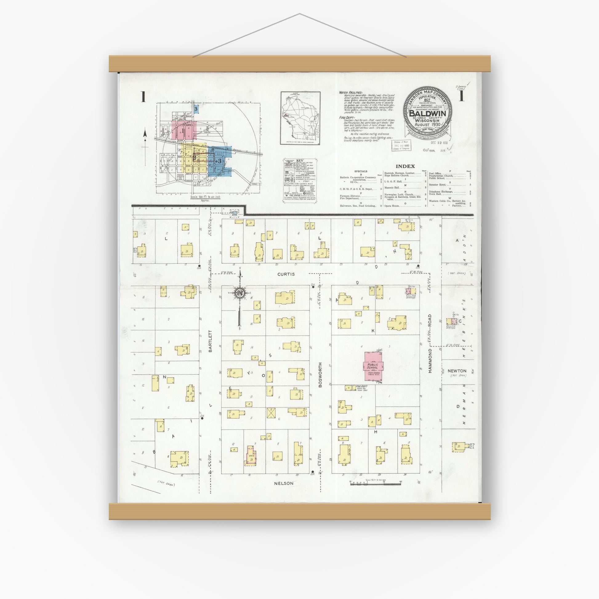 Old map wall art mockup — magnetic wood frame on white wall — Sanborn Fire Insurance Map from Baldwin, St. Croix County, Wisconsin (1930) - Complete Map Set