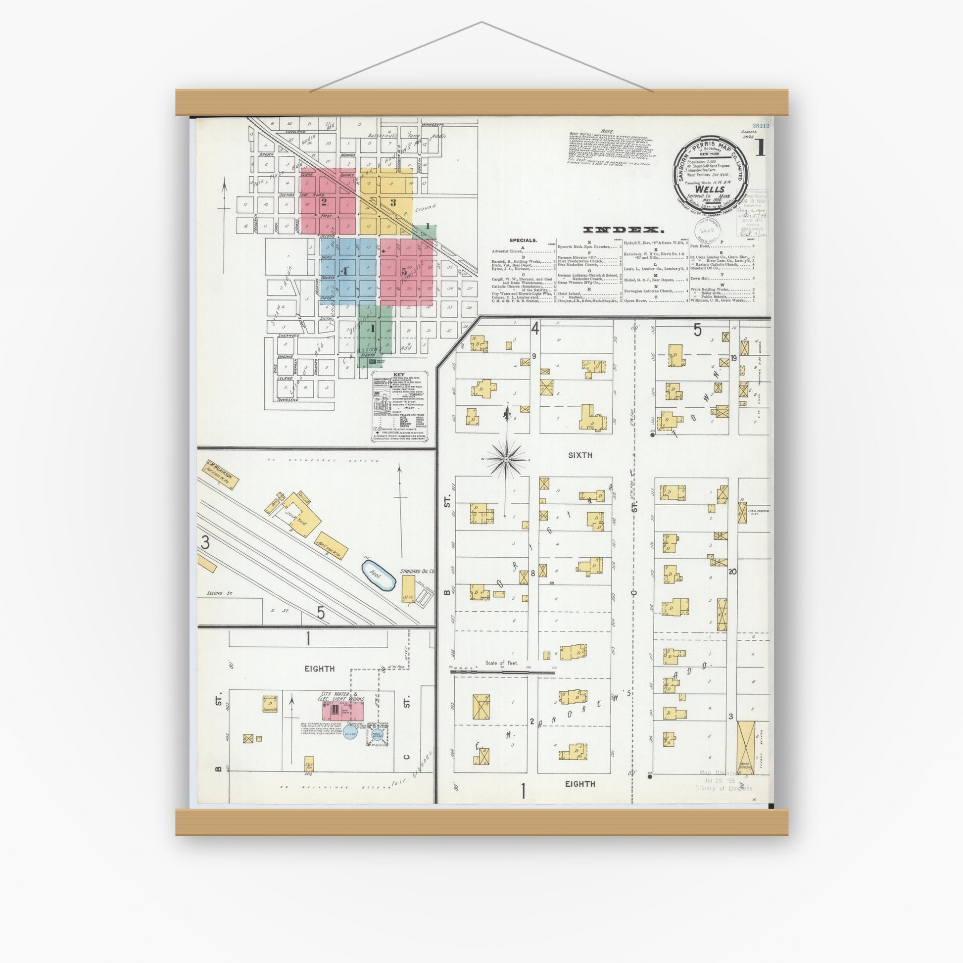Old map wall art mockup — magnetic wood frame on white wall — Sanborn Fire Insurance Map from Wells, Faribault County, Minnesota (1900) - Complete Map Set