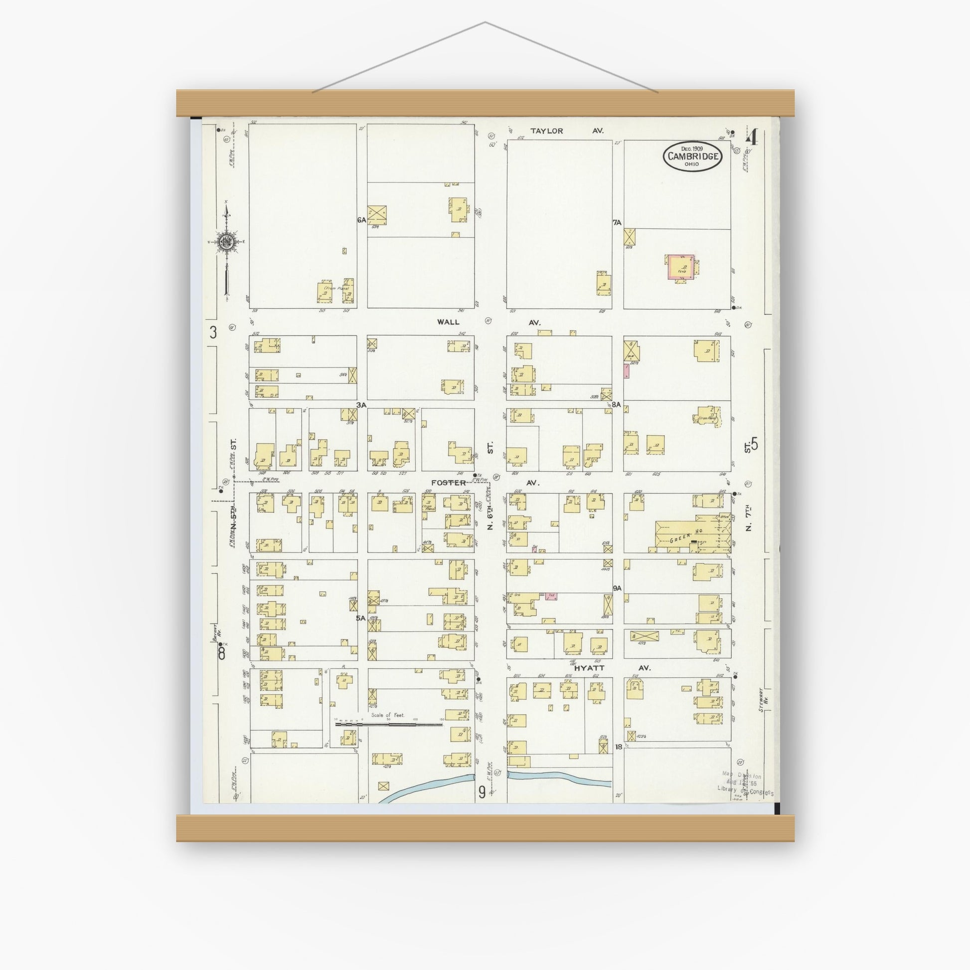 Old map wall art mockup — magnetic wood frame on white wall — Sanborn Fire Insurance Map from Cambridge, Guernsey County, Ohio (1909), Sheet #0004