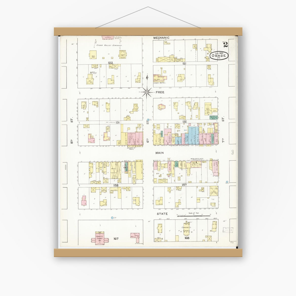 Old map wall art mockup — magnetic wood frame on white wall — Sanborn Fire Insurance Map from Osage, Mitchell County, Iowa (1892), Sheet #0002