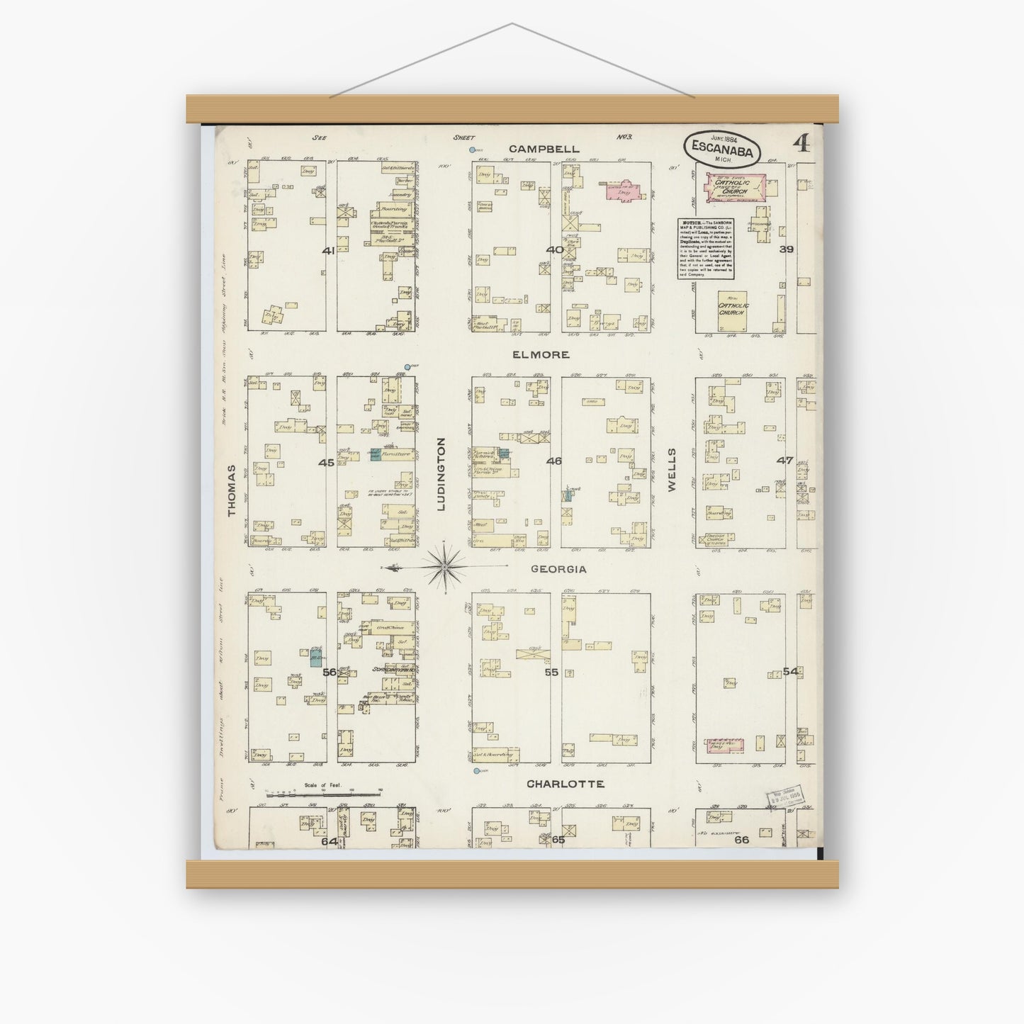 Old map wall art mockup — magnetic wood frame on white wall — Sanborn Fire Insurance Map from Escanaba, Delta County, Michigan (1884), Sheet #0004