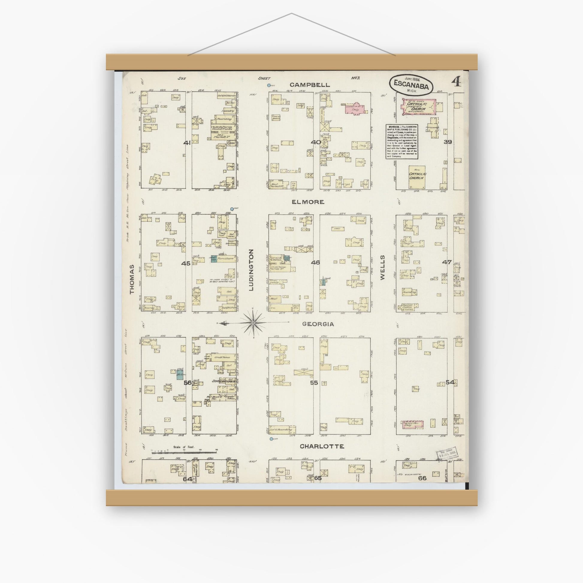 Old map wall art mockup — magnetic wood frame on white wall — Sanborn Fire Insurance Map from Escanaba, Delta County, Michigan (1884), Sheet #0004