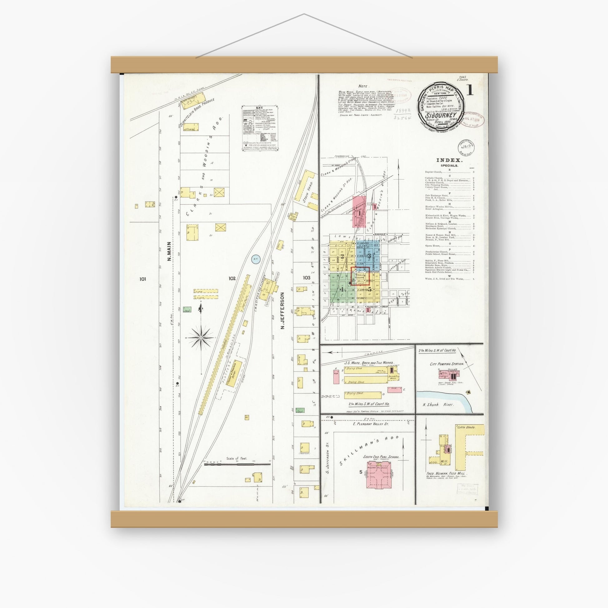 Old map wall art mockup — magnetic wood frame on white wall — Sanborn Fire Insurance Map from Sigourney, Kiokuk County, Iowa (1899), Sheet #0001