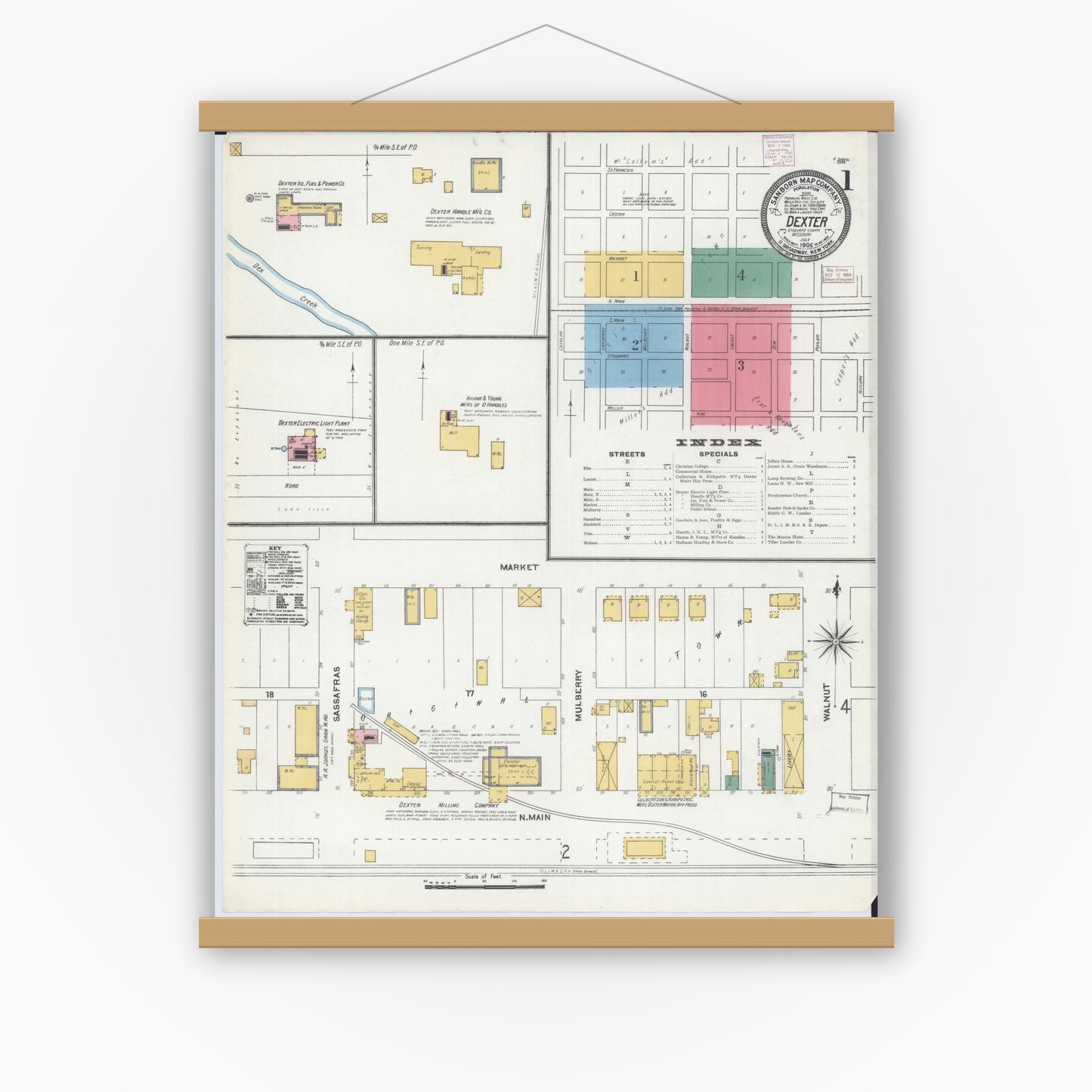 Old map wall art mockup — magnetic wood frame on white wall — Sanborn Fire Insurance Map from Dexter, Stoddard County, Missouri (1906) - Complete Map Set