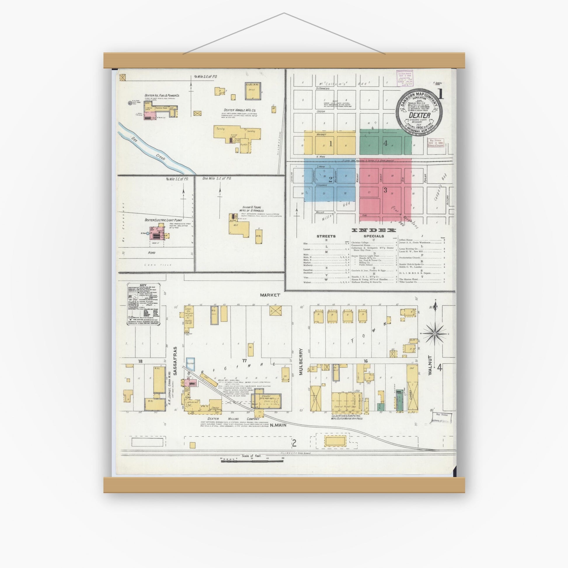Old map wall art mockup — magnetic wood frame on white wall — Sanborn Fire Insurance Map from Dexter, Stoddard County, Missouri (1906) - Complete Map Set