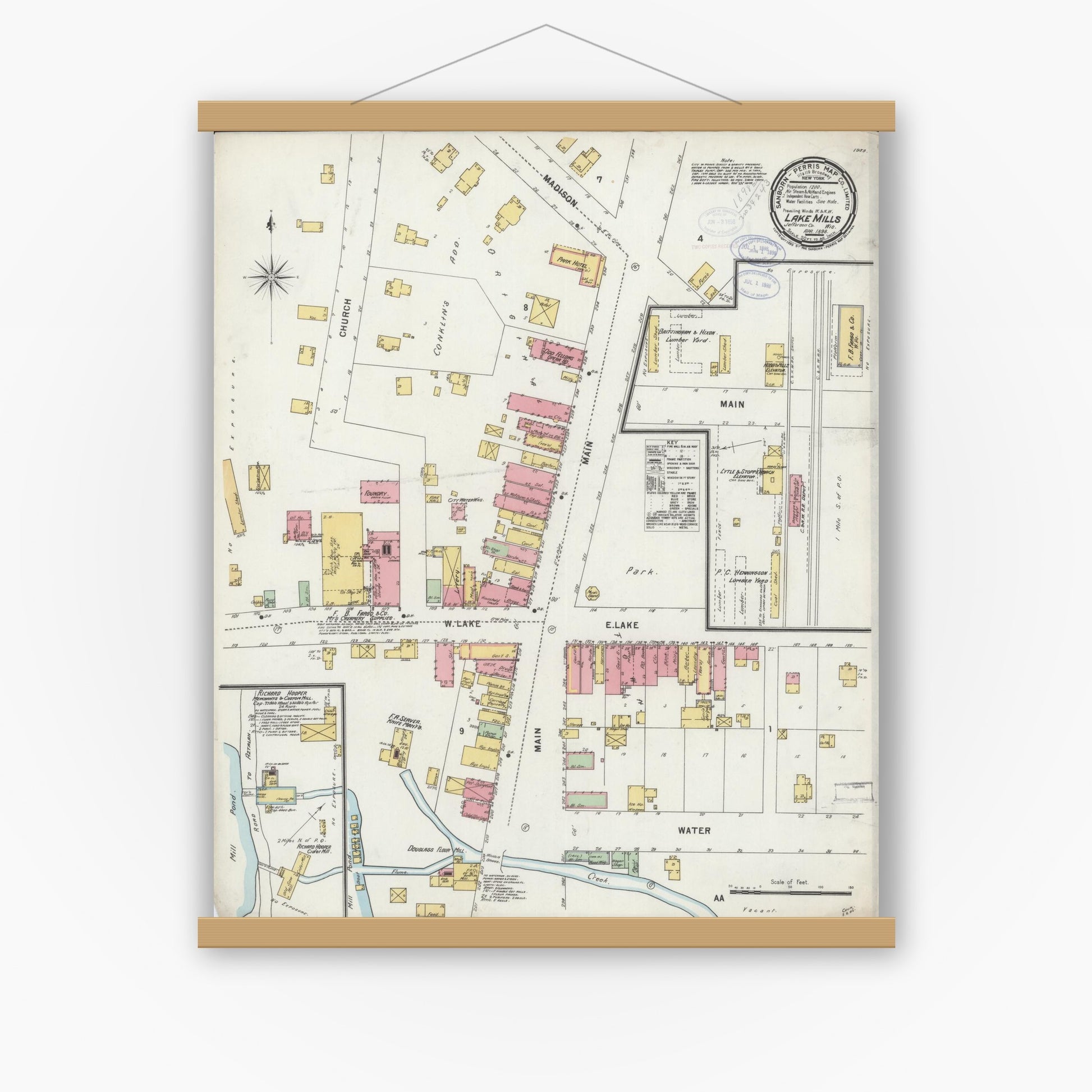 Old map wall art mockup — magnetic wood frame on white wall — Sanborn Fire Insurance Map from Lake Mills, Jefferson County, Wisconsin (1898), Sheet #0001