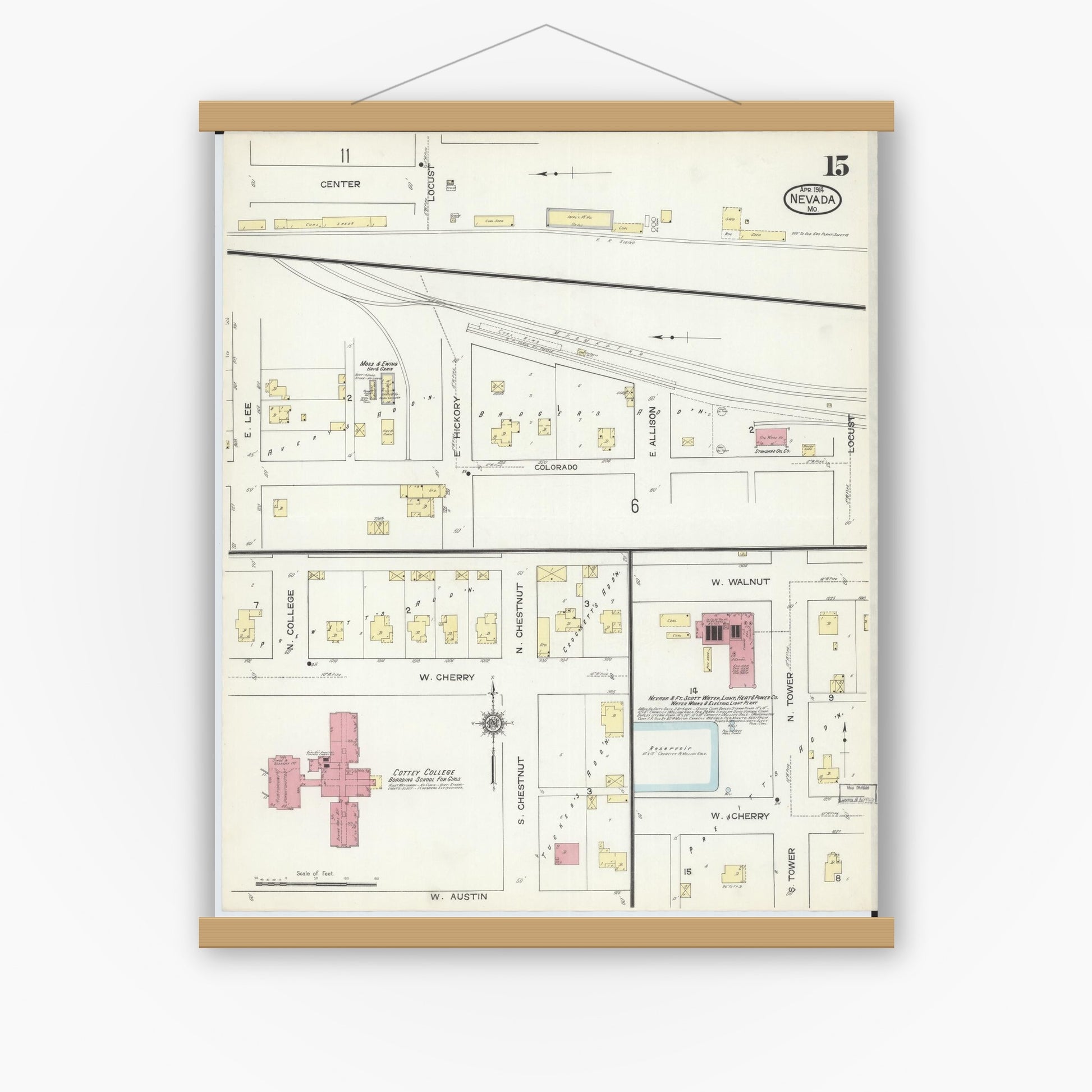 Old map wall art mockup — magnetic wood frame on white wall — Sanborn Fire Insurance Map from Nevada, Vernon County, Missouri (1914), Sheet #0015