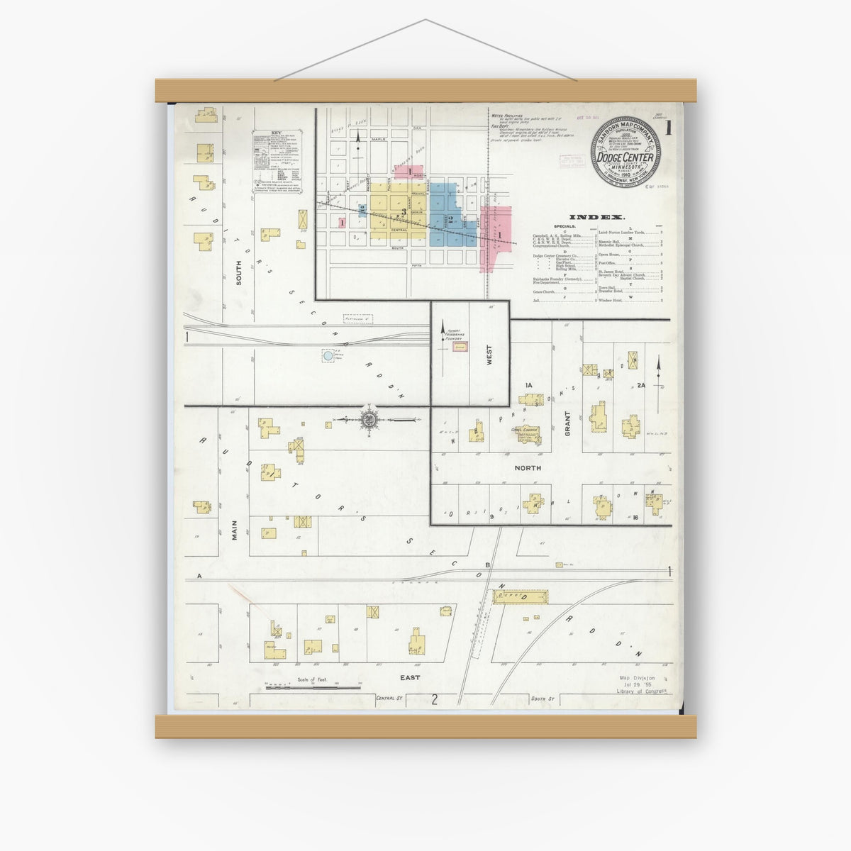 Old map wall art mockup — magnetic wood frame on white wall — Sanborn Fire Insurance Map from Dodge Center, Dodge County, Minnesota (1910), Sheet #0001