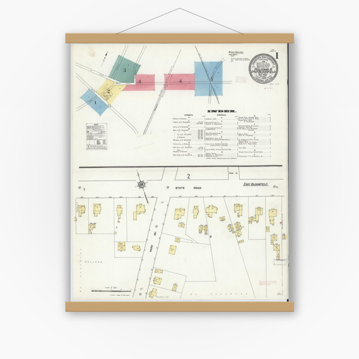 Old map wall art mockup — magnetic wood frame on white wall — Sanborn Fire Insurance Map from Holcomb, Ontario County, New York (1909), Sheet #0001