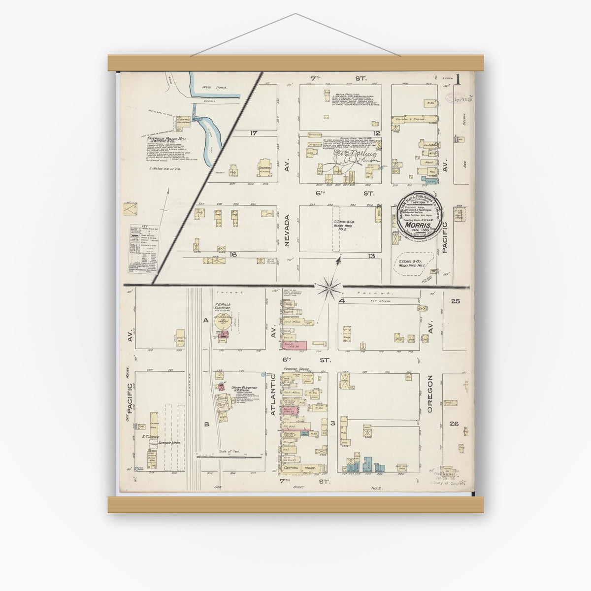 Old map wall art mockup — magnetic wood frame on white wall — Sanborn Fire Insurance Map from Morris, Stevens County, Minnesota (1885) - Complete Map Set