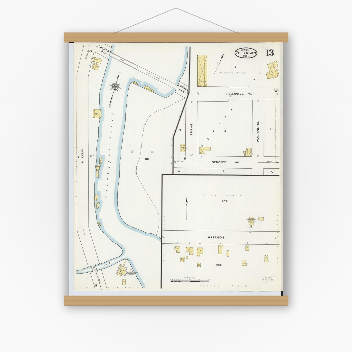 Old map wall art mockup — magnetic wood frame on white wall — Sanborn Fire Insurance Map from Cheboygan, Cheboygan County, Michigan (1915), Sheet #0013