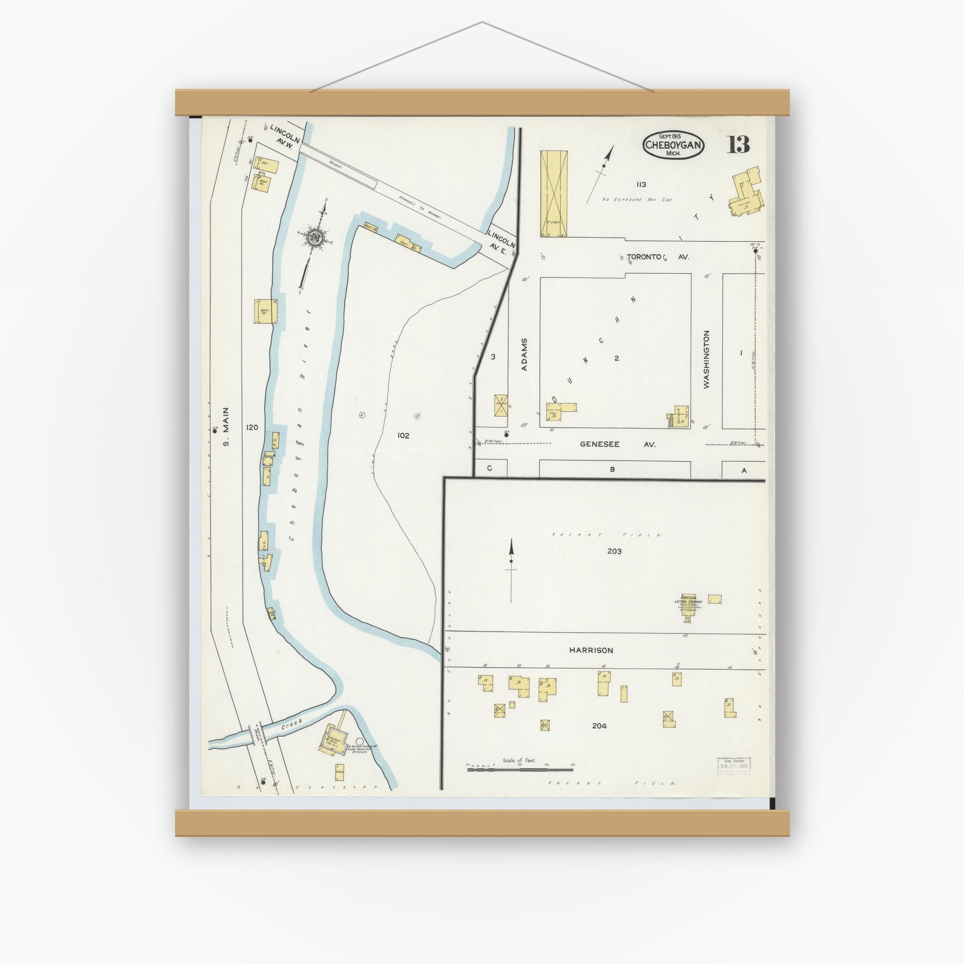 Old map wall art mockup — magnetic wood frame on white wall — Sanborn Fire Insurance Map from Cheboygan, Cheboygan County, Michigan (1915), Sheet #0013