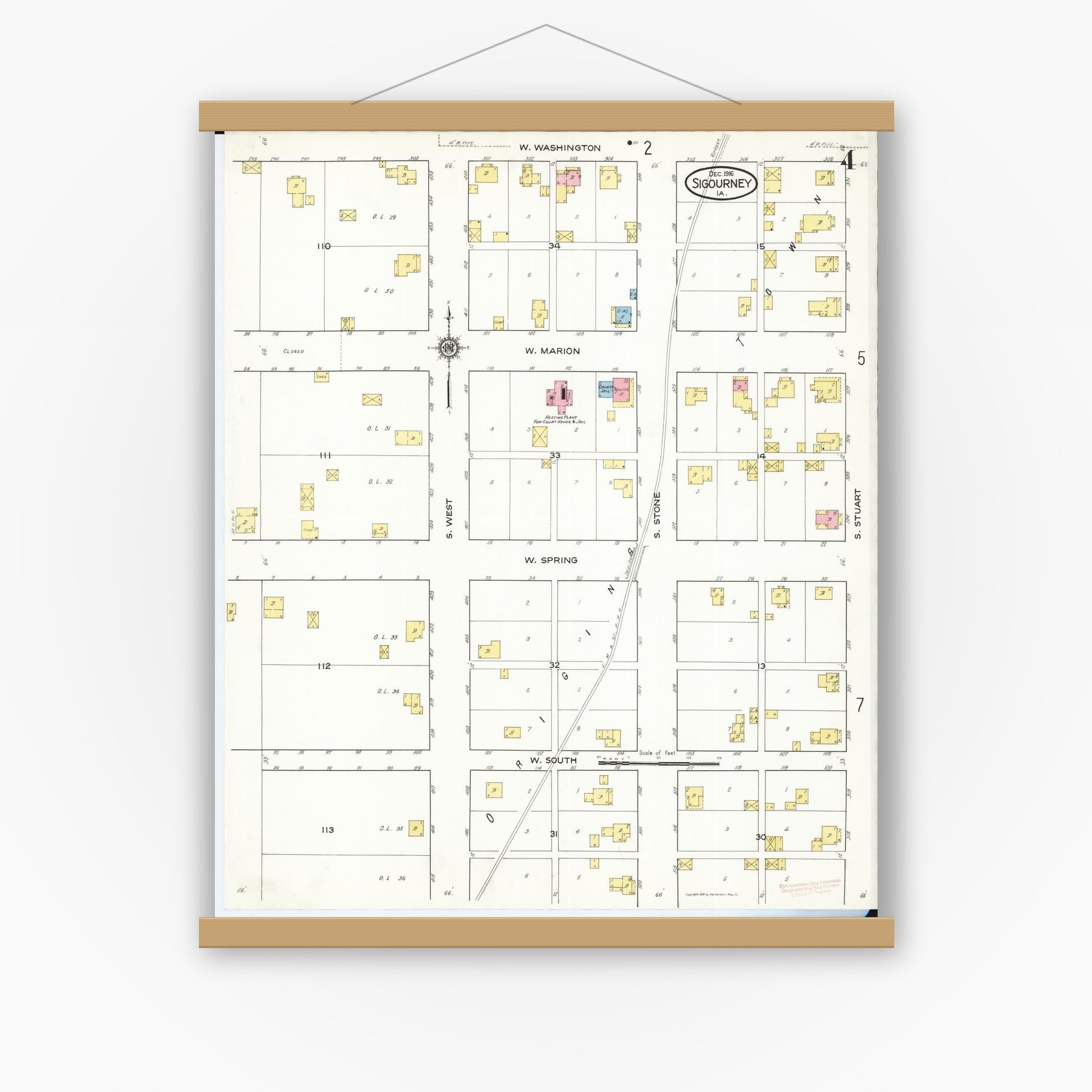 Old map wall art mockup — magnetic wood frame on white wall — Sanborn Fire Insurance Map from Sigourney, Kiokuk County, Iowa (1916), Sheet #0004