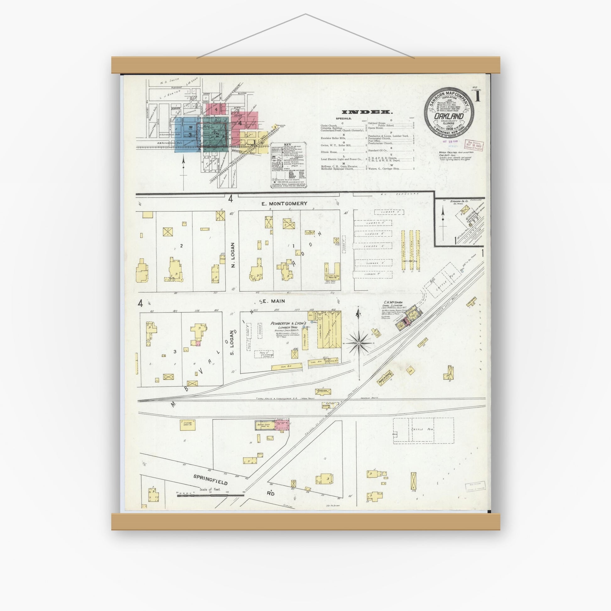 Old map wall art mockup — magnetic wood frame on white wall — Sanborn Fire Insurance Map from Oakland, Coles County, Illinois (1909), Sheet #0001