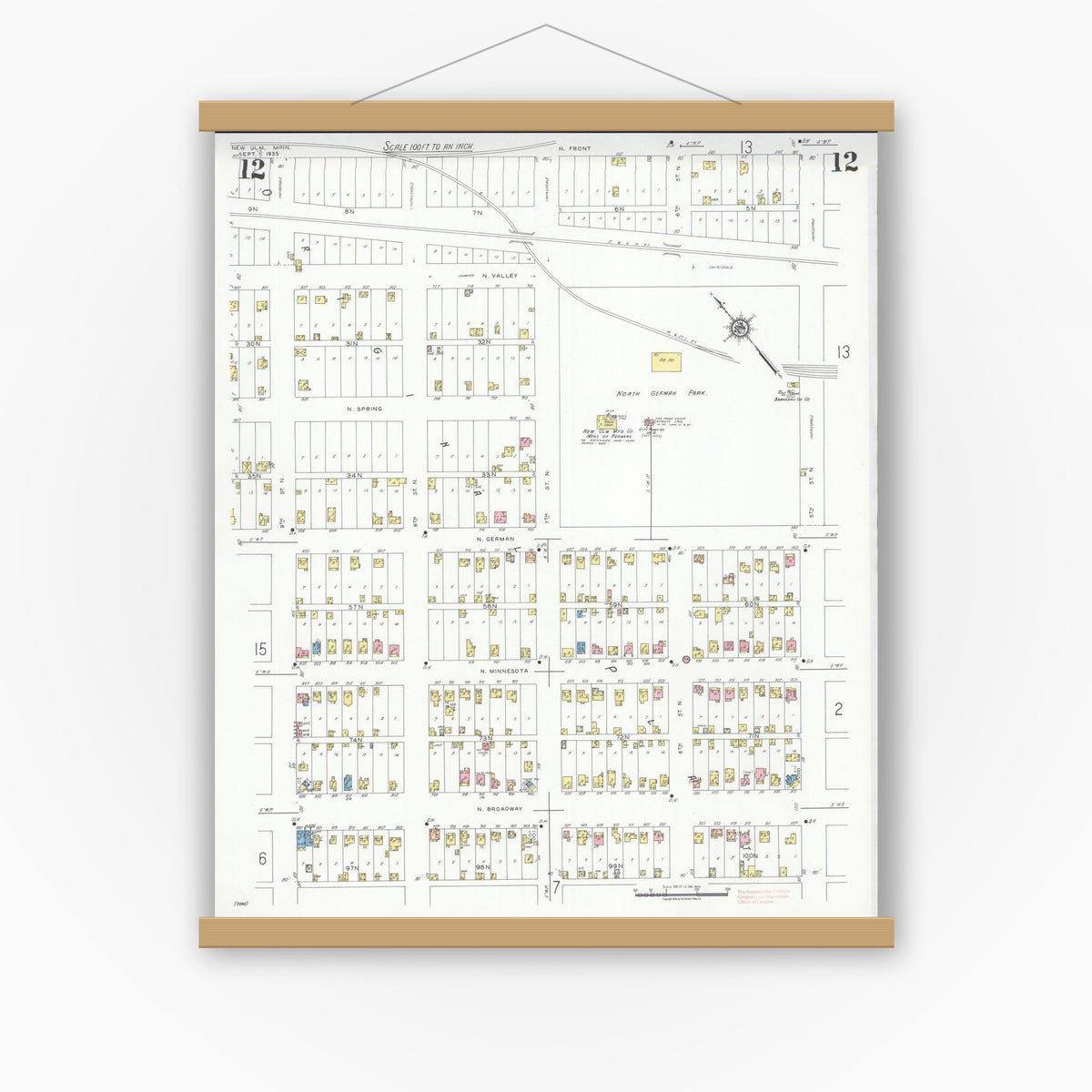 Old map wall art mockup — magnetic wood frame on white wall — Sanborn Fire Insurance Map from New Ulm, Brown County, Minnesota (1935), Sheet #0012