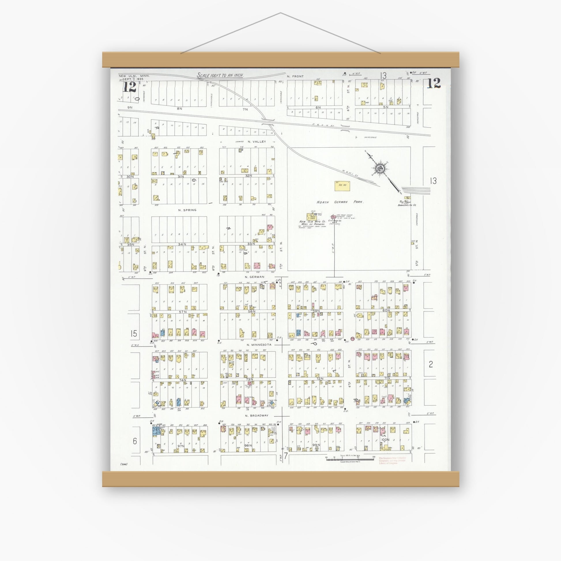 Old map wall art mockup — magnetic wood frame on white wall — Sanborn Fire Insurance Map from New Ulm, Brown County, Minnesota (1935), Sheet #0012