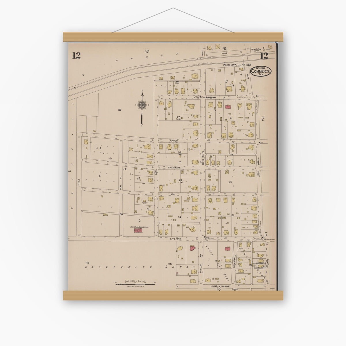 Old map wall art mockup — magnetic wood frame on white wall — Sanborn Fire Insurance Map from Commerce, Hunt County, Texas (1922), Sheet #0012