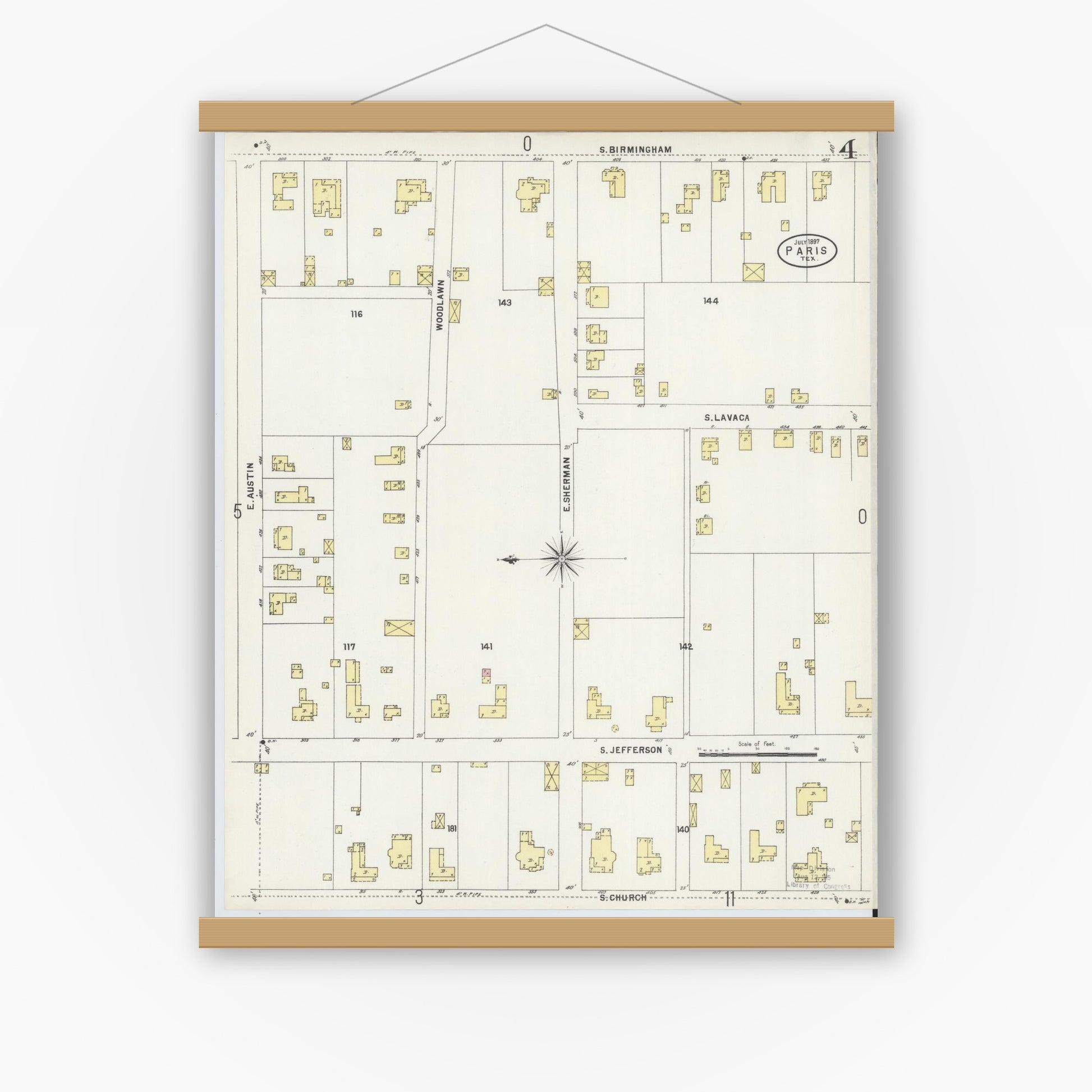 Old map wall art mockup — magnetic wood frame on white wall — Sanborn Fire Insurance Map from Paris, Lamar County, Texas (1897), Sheet #0004