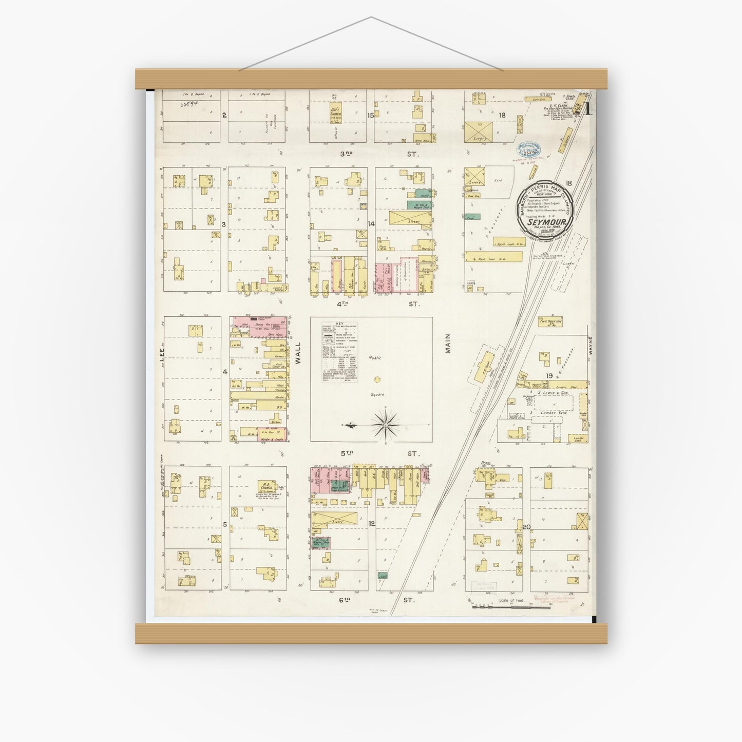 Old map wall art mockup — magnetic wood frame on white wall — Sanborn Fire Insurance Map from Seymour, Wayne County, Iowa (1894) â€” Complete Set