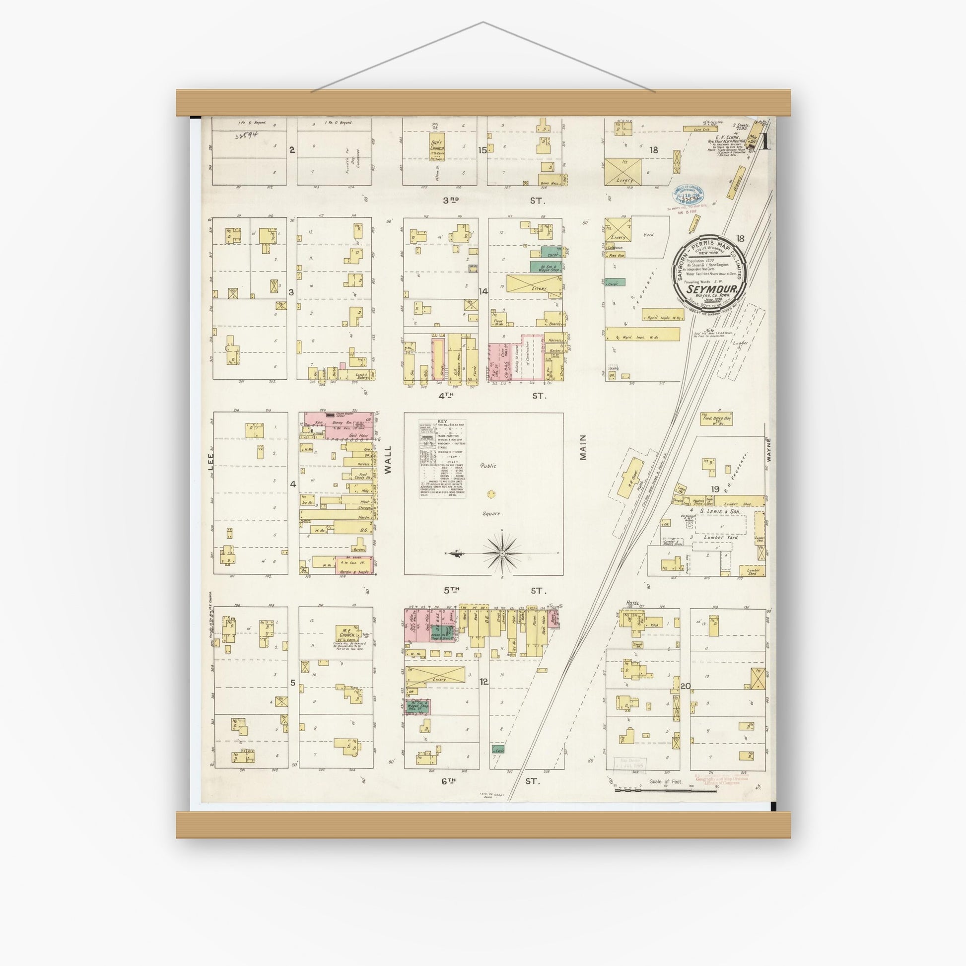 Old map wall art mockup — magnetic wood frame on white wall — Sanborn Fire Insurance Map from Seymour, Wayne County, Iowa (1894) â€” Complete Set