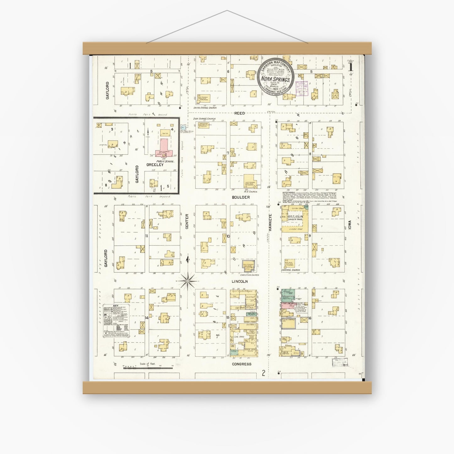 Old map wall art mockup — magnetic wood frame on white wall — Sanborn Fire Insurance Map from Nora Springs, Floyd County, Iowa (1902) â€” Complete Set