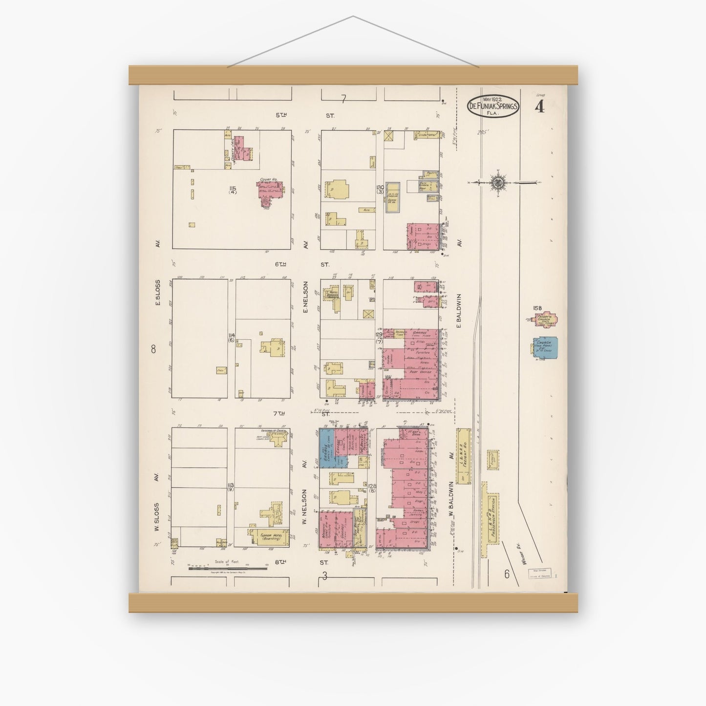 Old map wall art mockup — magnetic wood frame on white wall — Sanborn Fire Insurance Map from De Funiak Springs, Walton County, Florida (1922), Sheet #0004